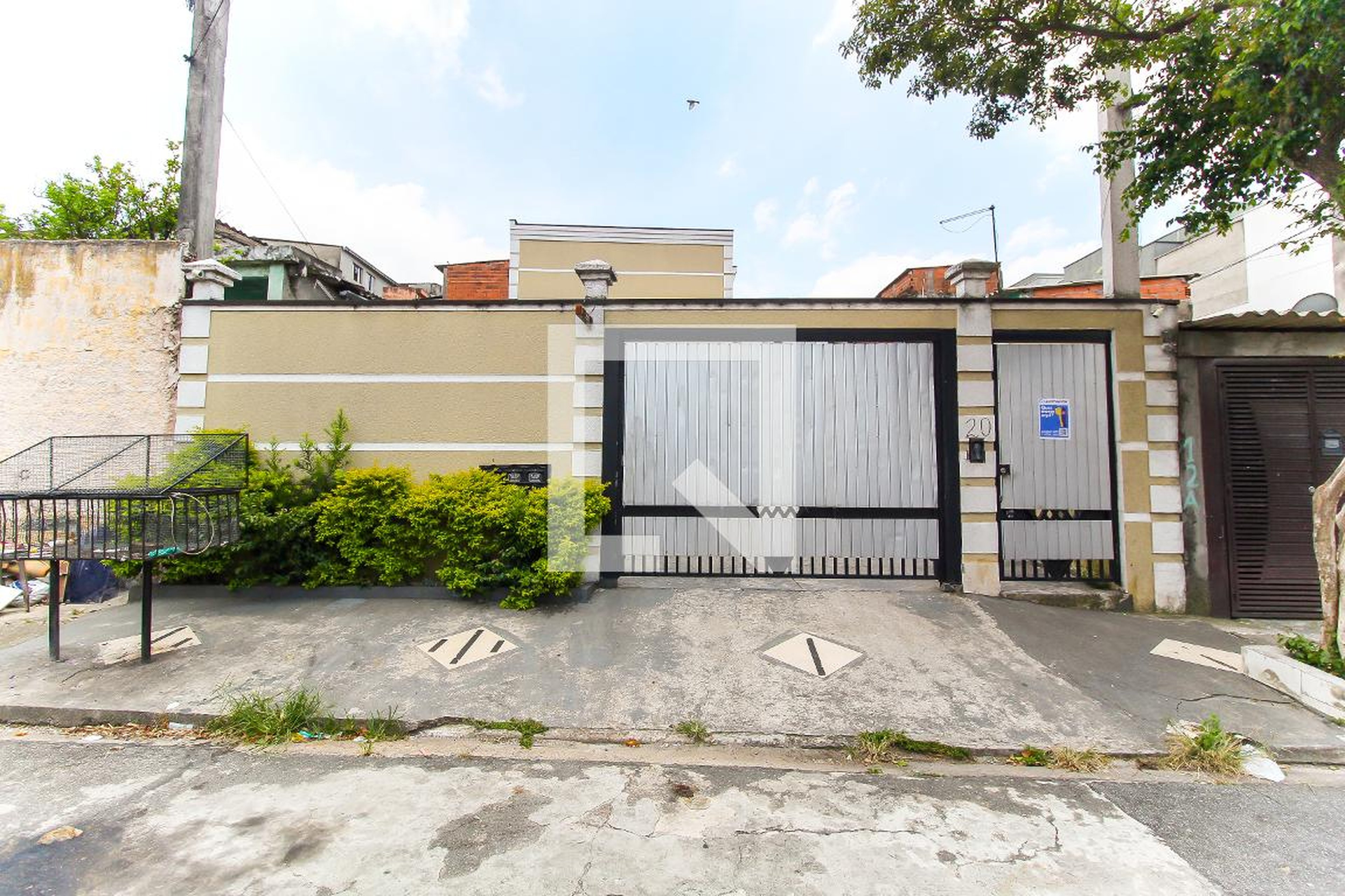 Fachada Condomínio em Rua Flôr de Júpiter, 20