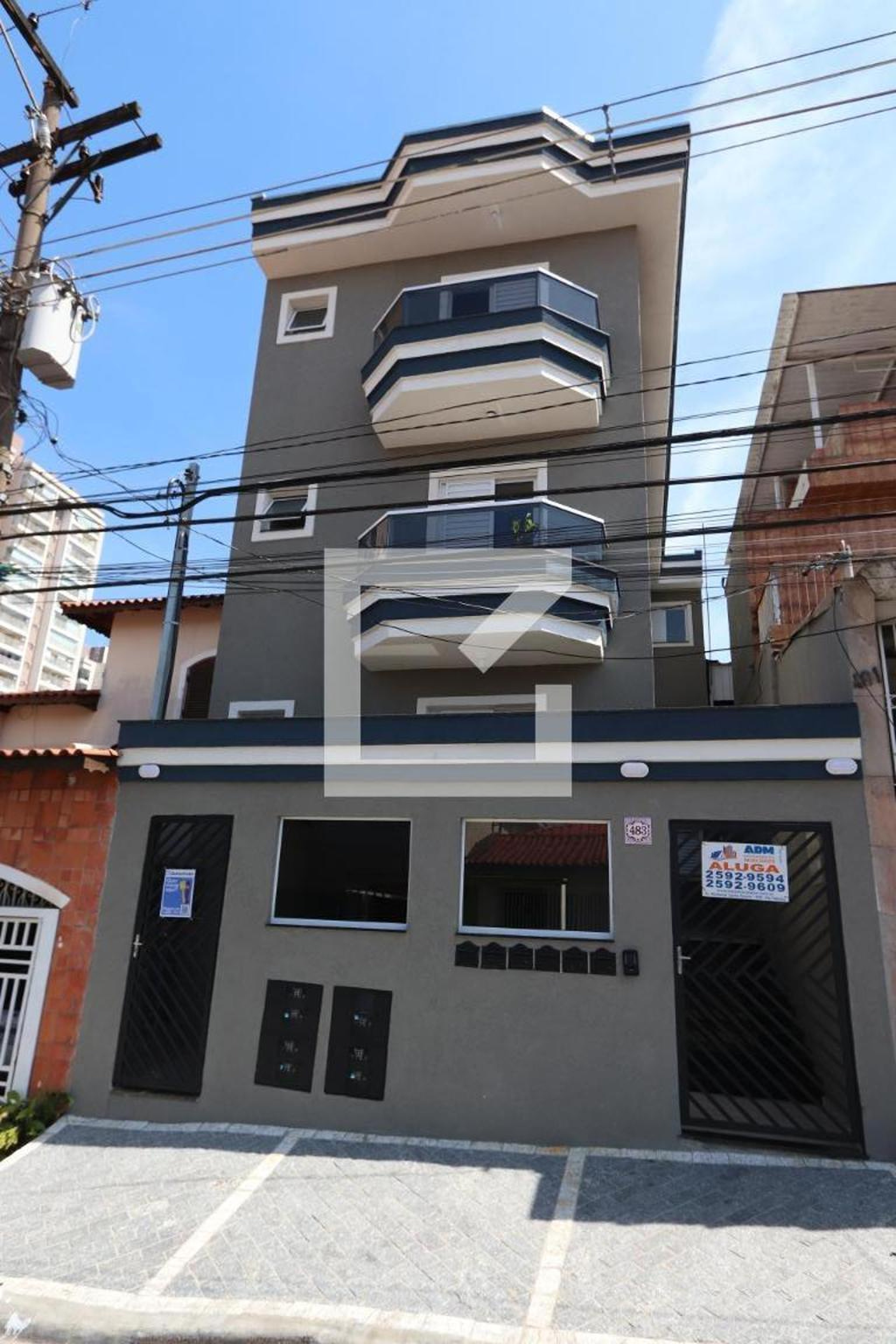 Fachada Condomínio em Rua Carlito, 483