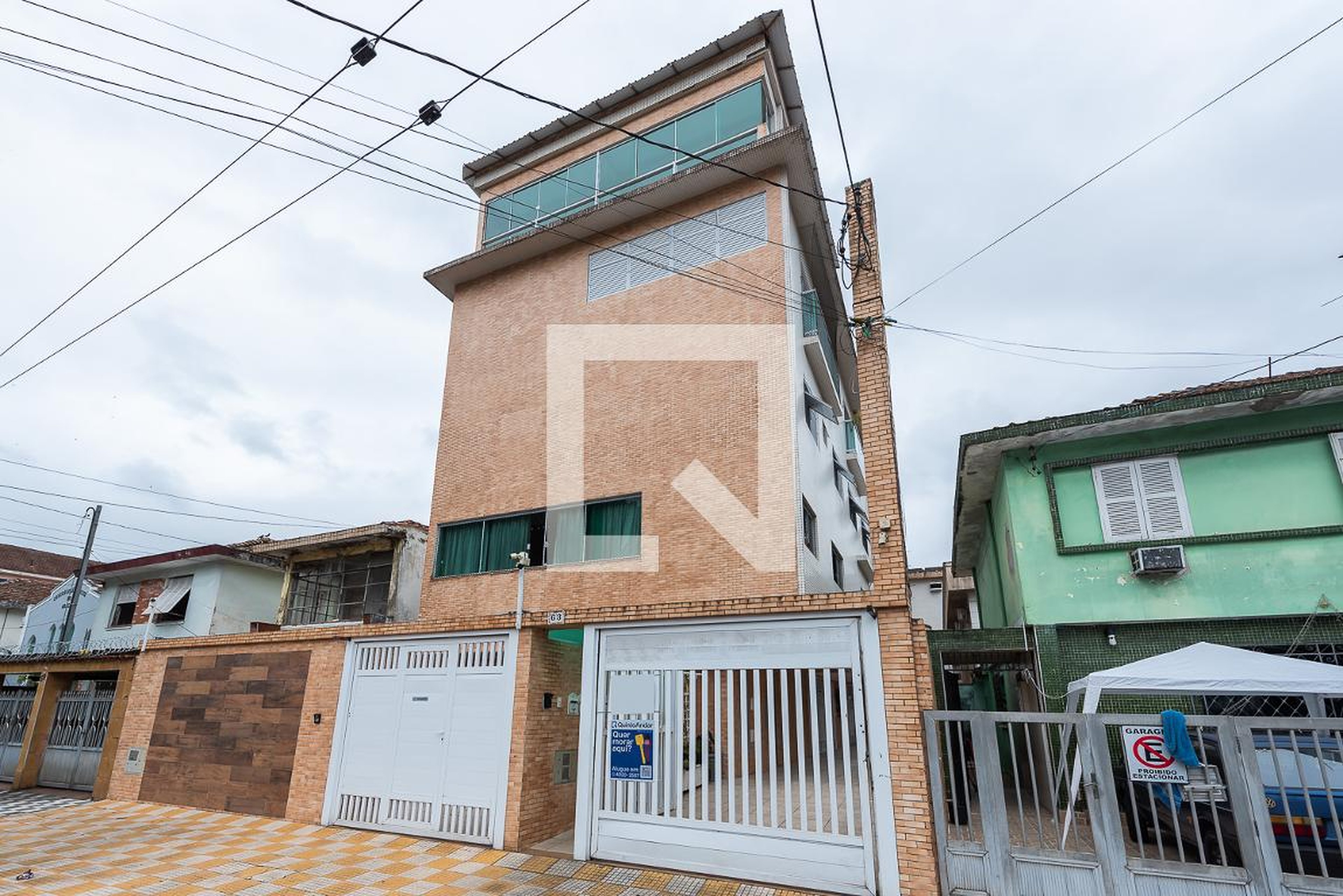 Fachada Condomínio em Rua Alfredo Albertini, 63