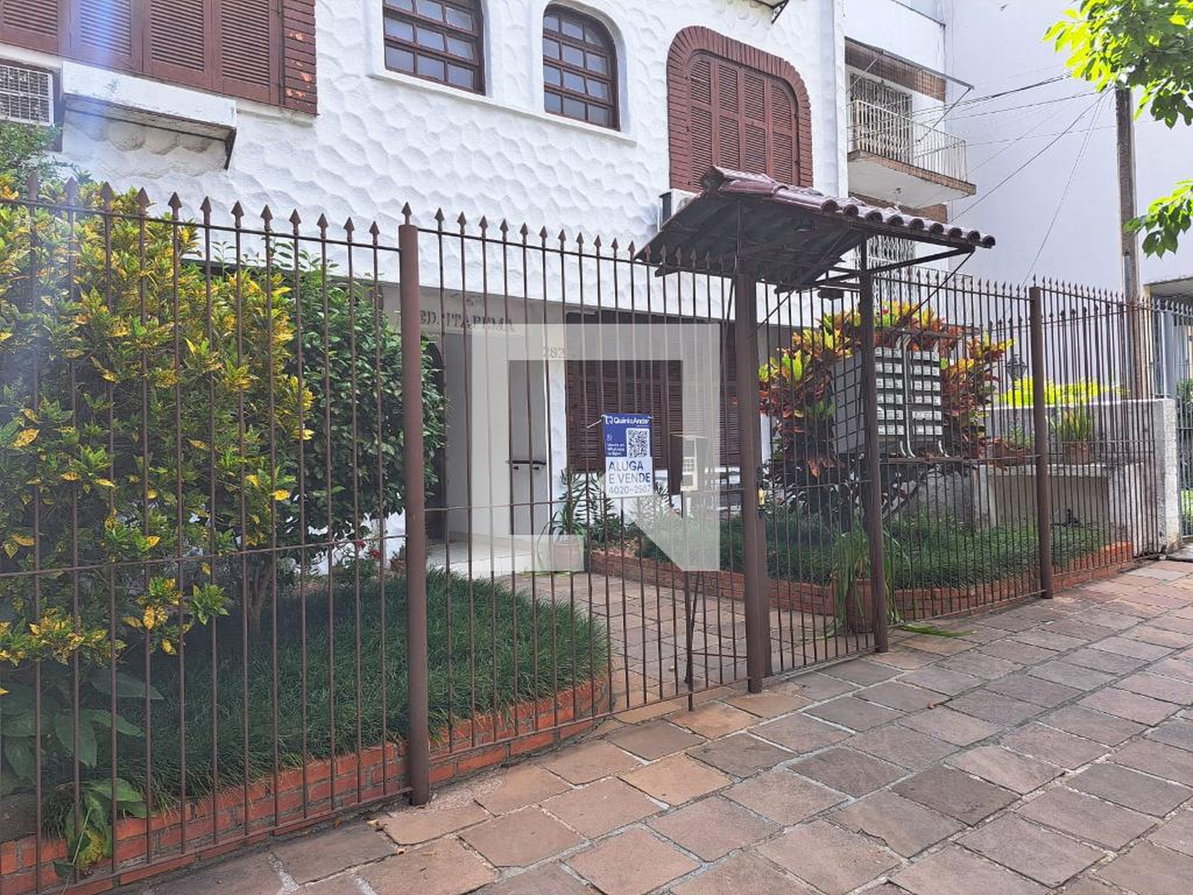 Fachada Condomínio em Rua Comendador Rheingantz, 282