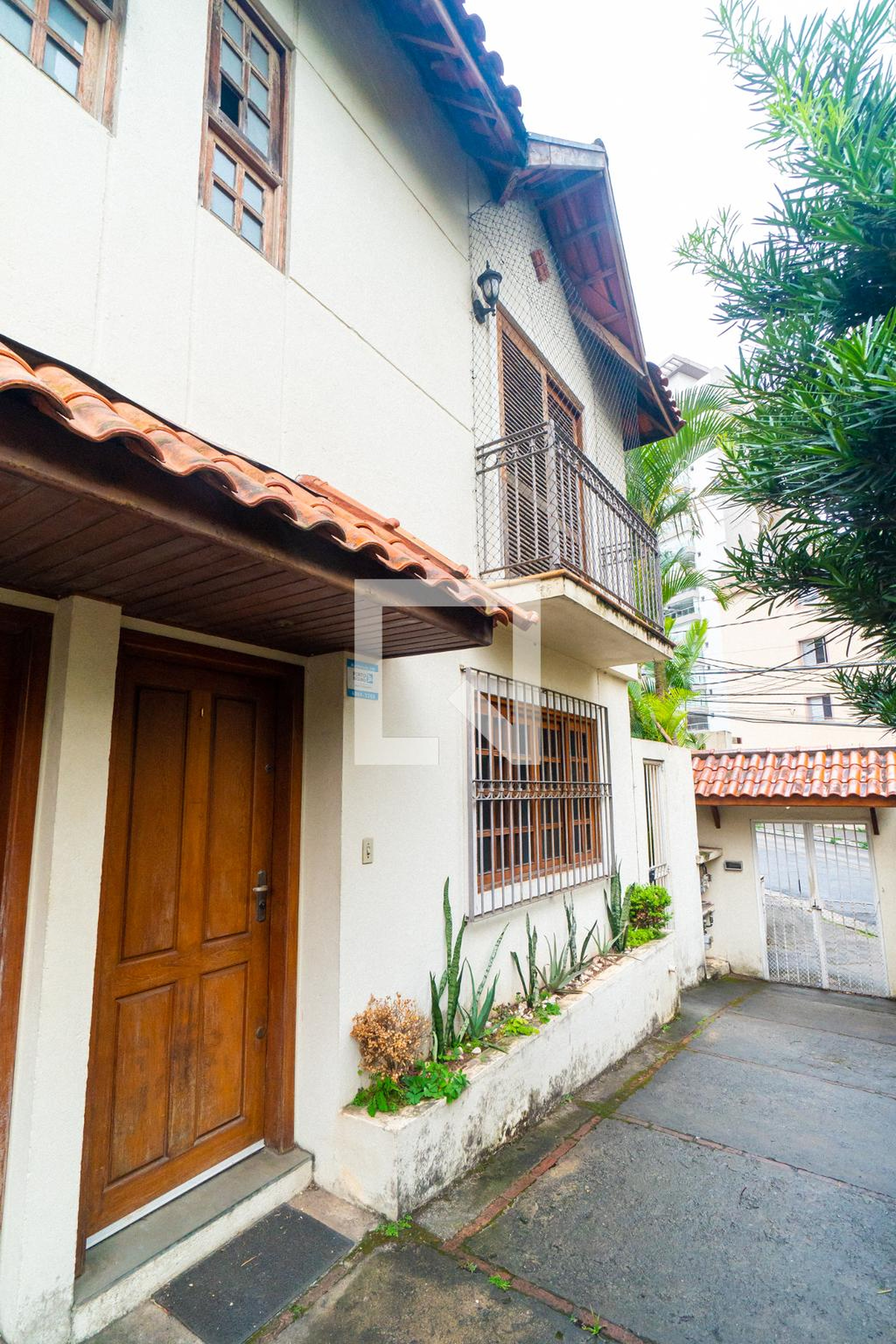 Fachada Condomínio em Rua Correia de Lemos, 594