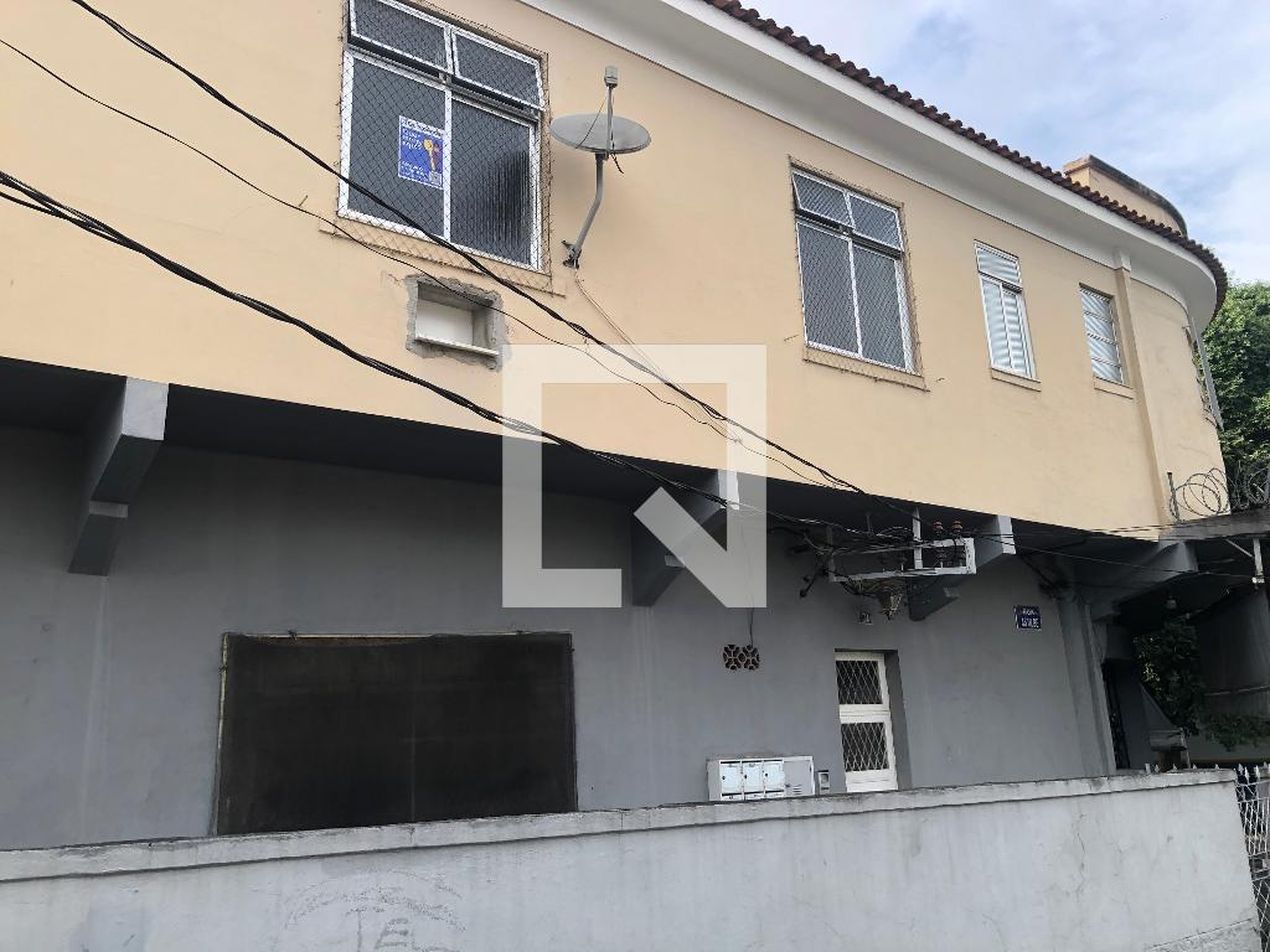 Fachada Condomínio em Rua Astilbe, 74