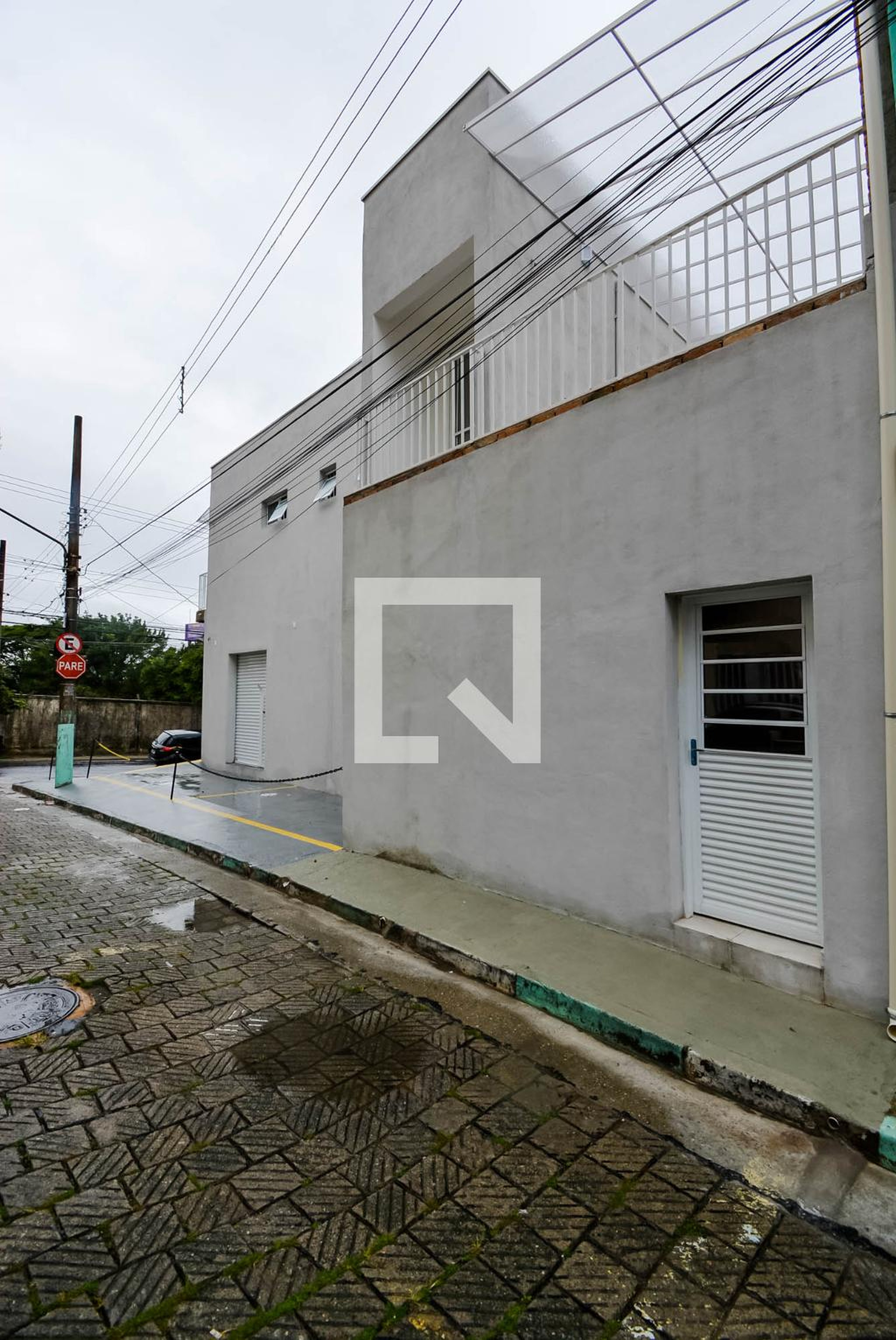 Fachada Condomínio em Rua das Palmeiras, 83