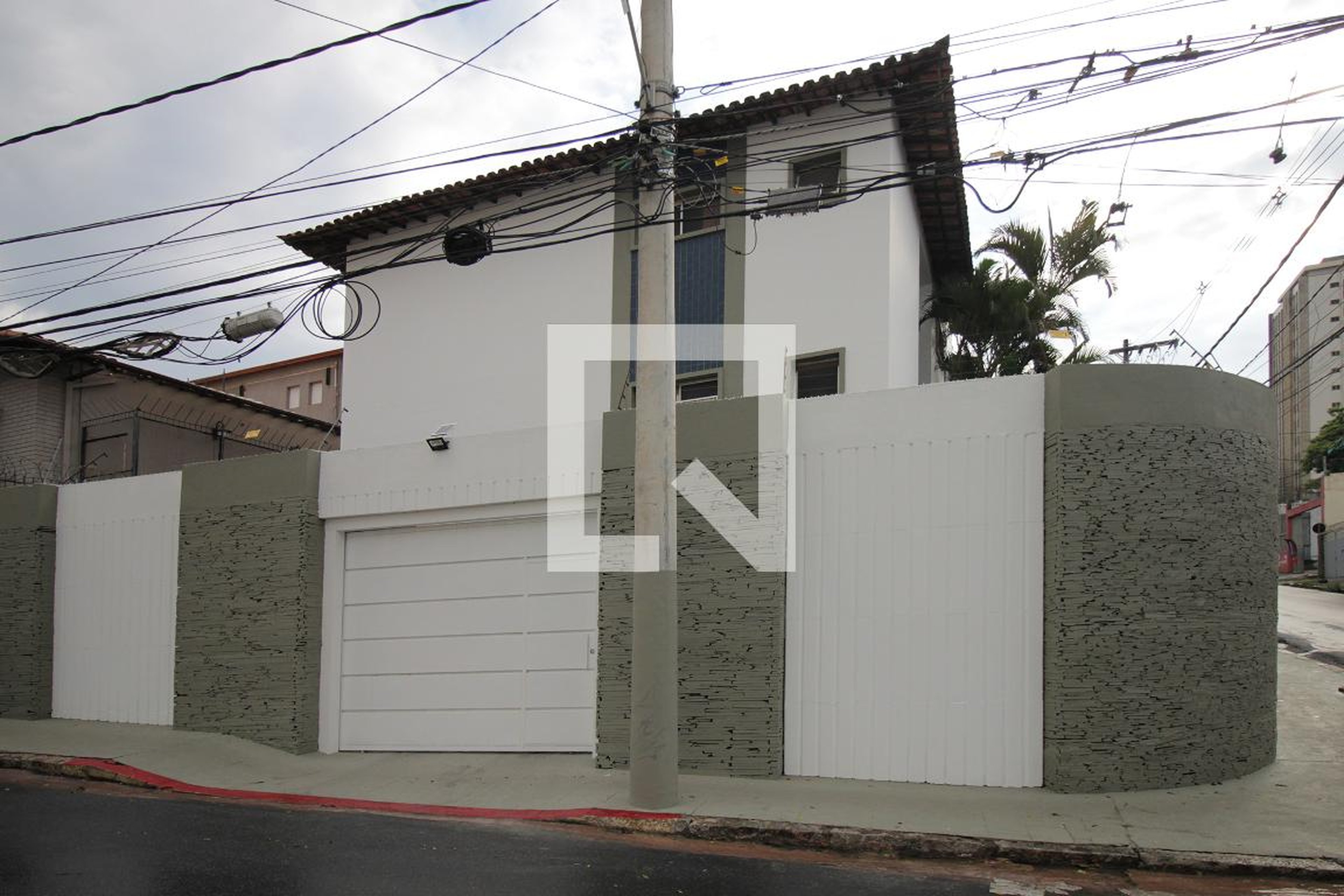 Fachada Condomínio em Rua Raul Mendes, 52