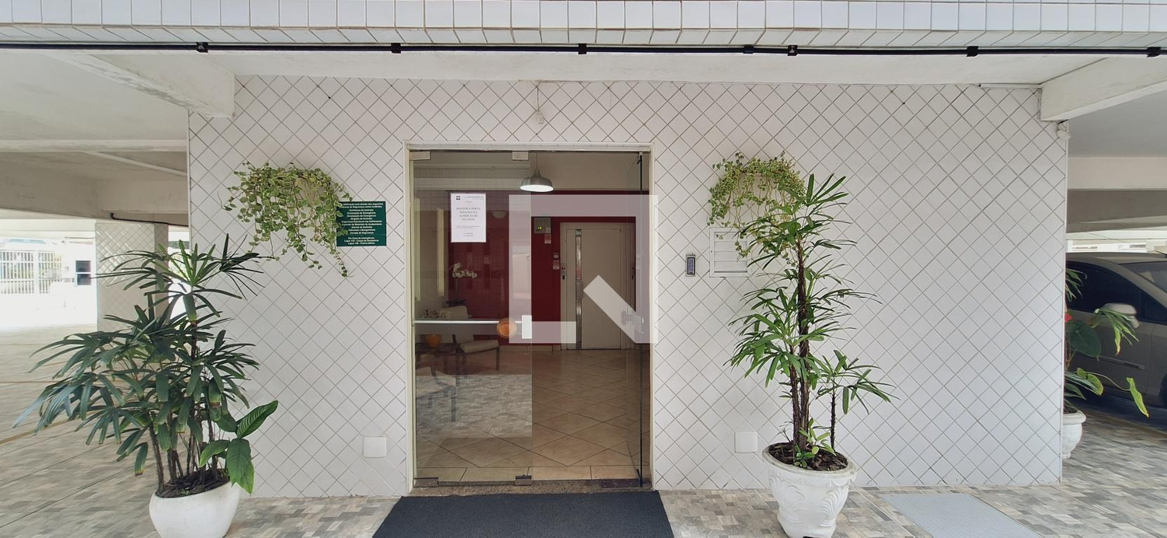 Entrada Condomínio Conjunto Residencial das Praias+Edifício Saquarema