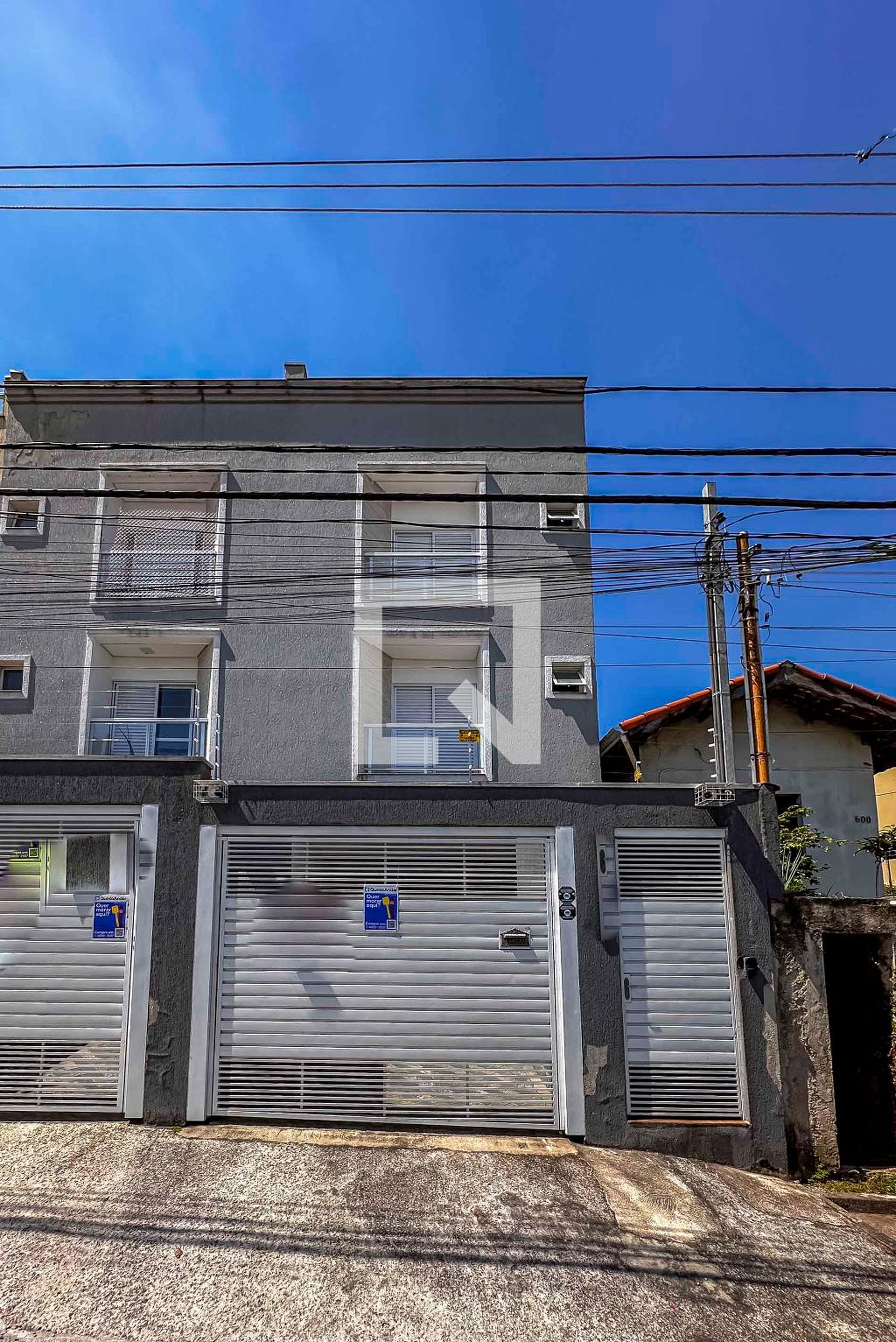 Fachada Condomínio em Rua Anhaia, 608