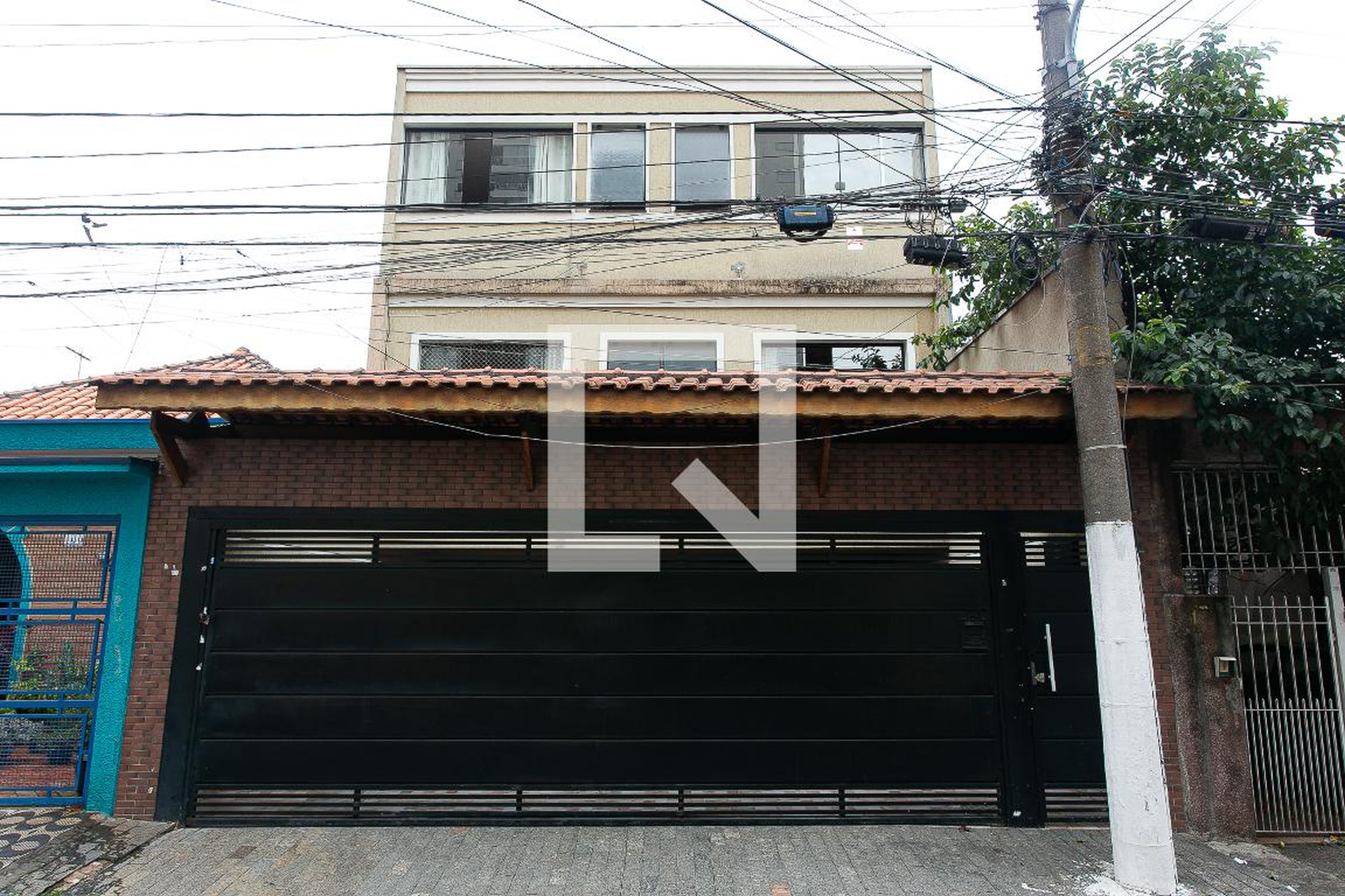 Fachada do Condomínio Condomínio em Rua Coronel Quartim, 205