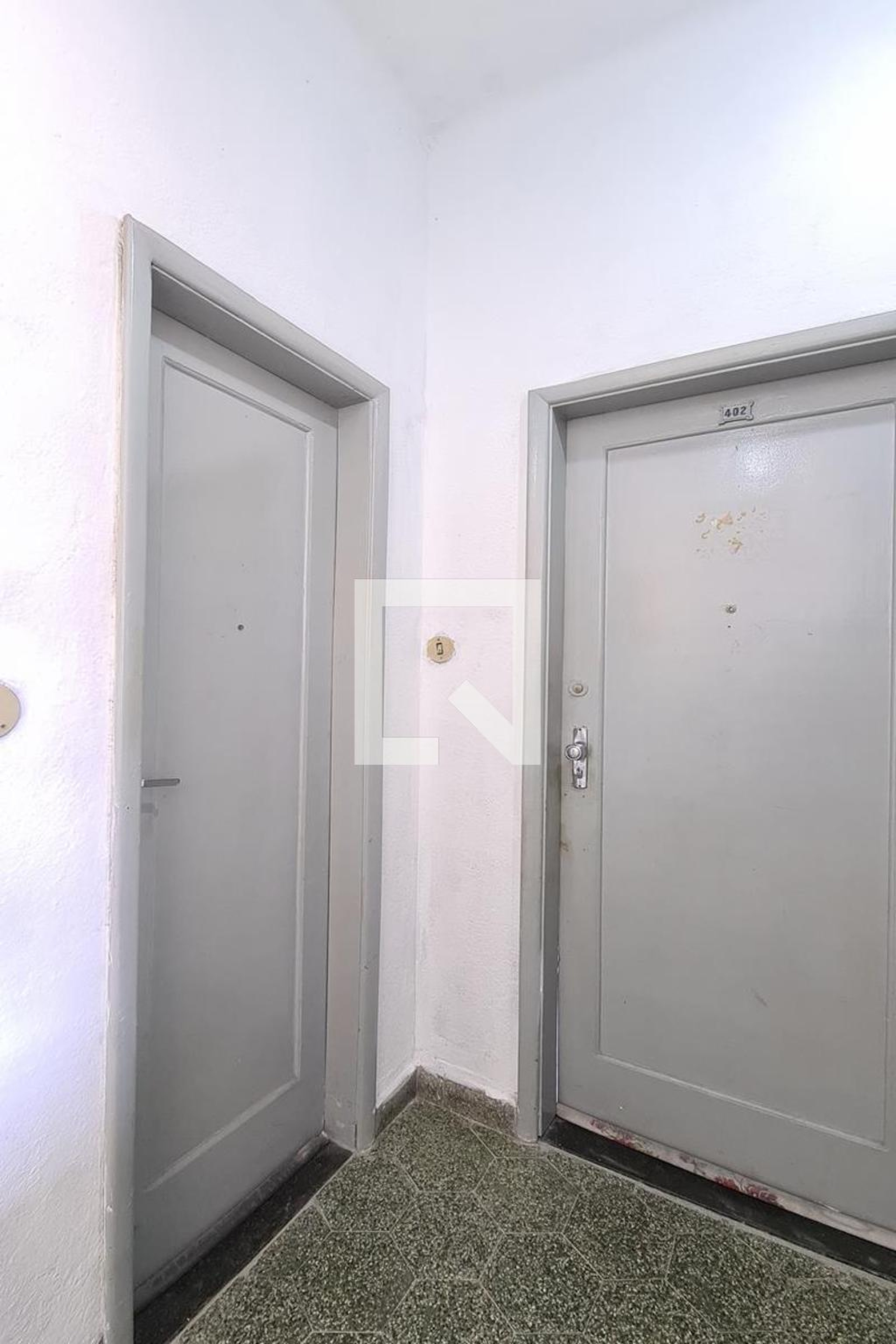 Entrada Condomínio em Rua Souto, 520