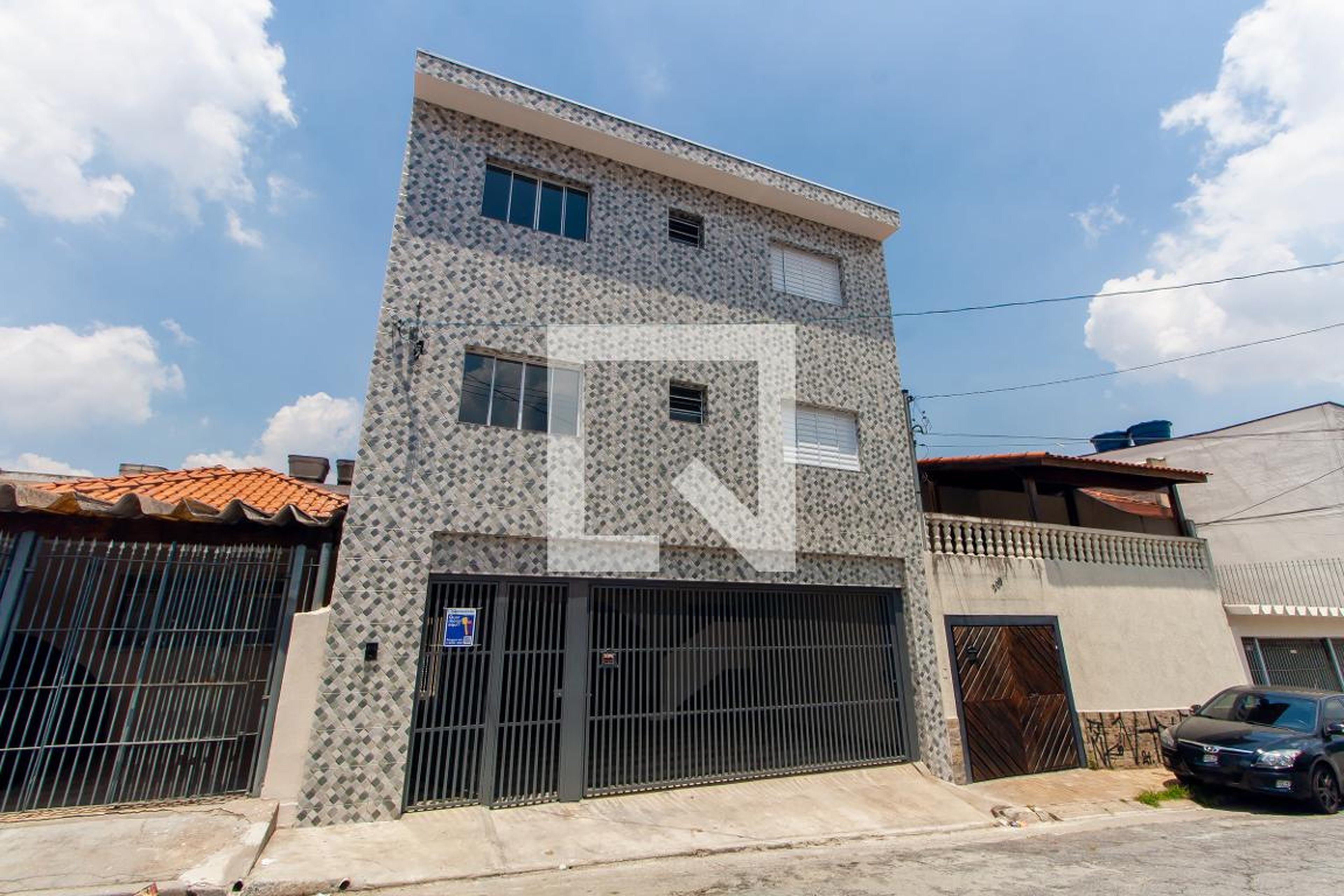 Fachada Condomínio em Rua João Tauler, 201
