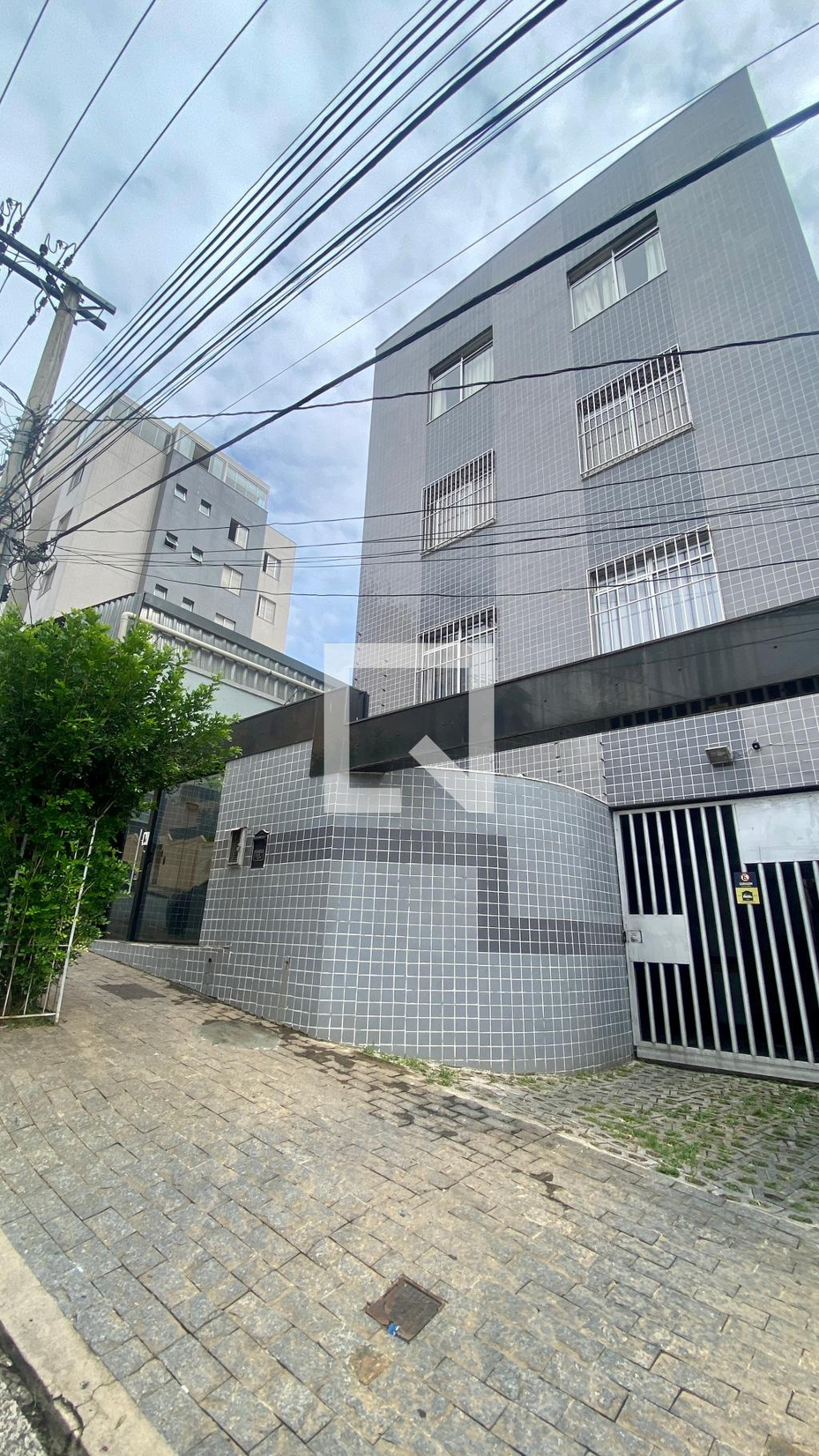 Fachada do Prédio Condomínio em Rua das Camélias, 70