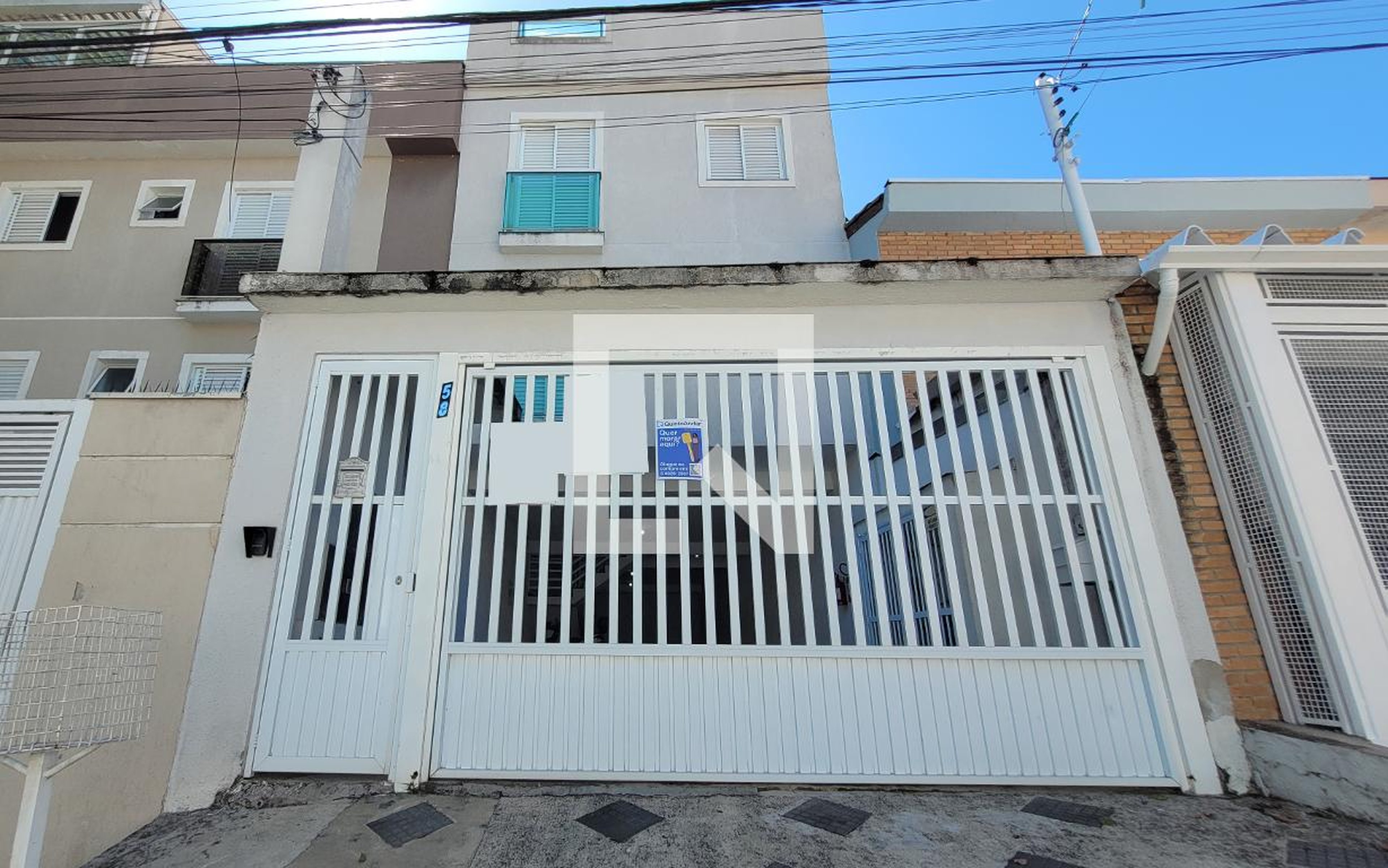 Fachada Condomínio em Rua José Pezolo, 58