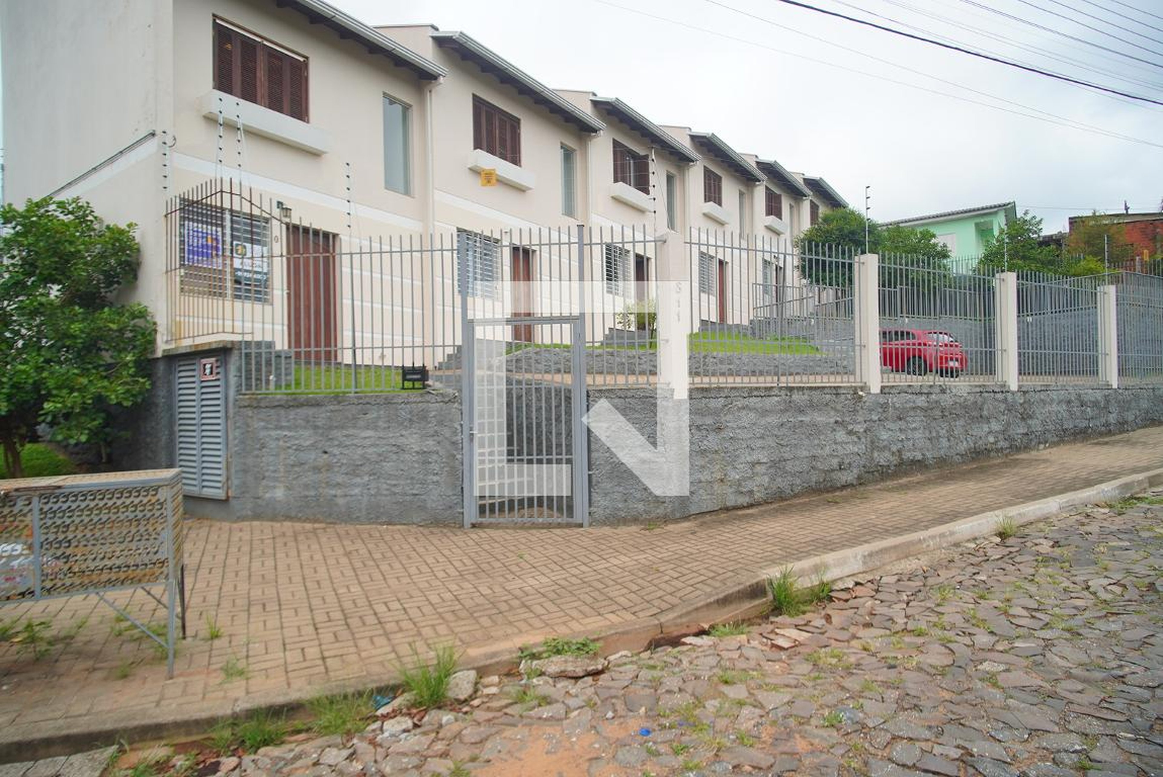 Fachada Condomínio em Rua Áustria, 811