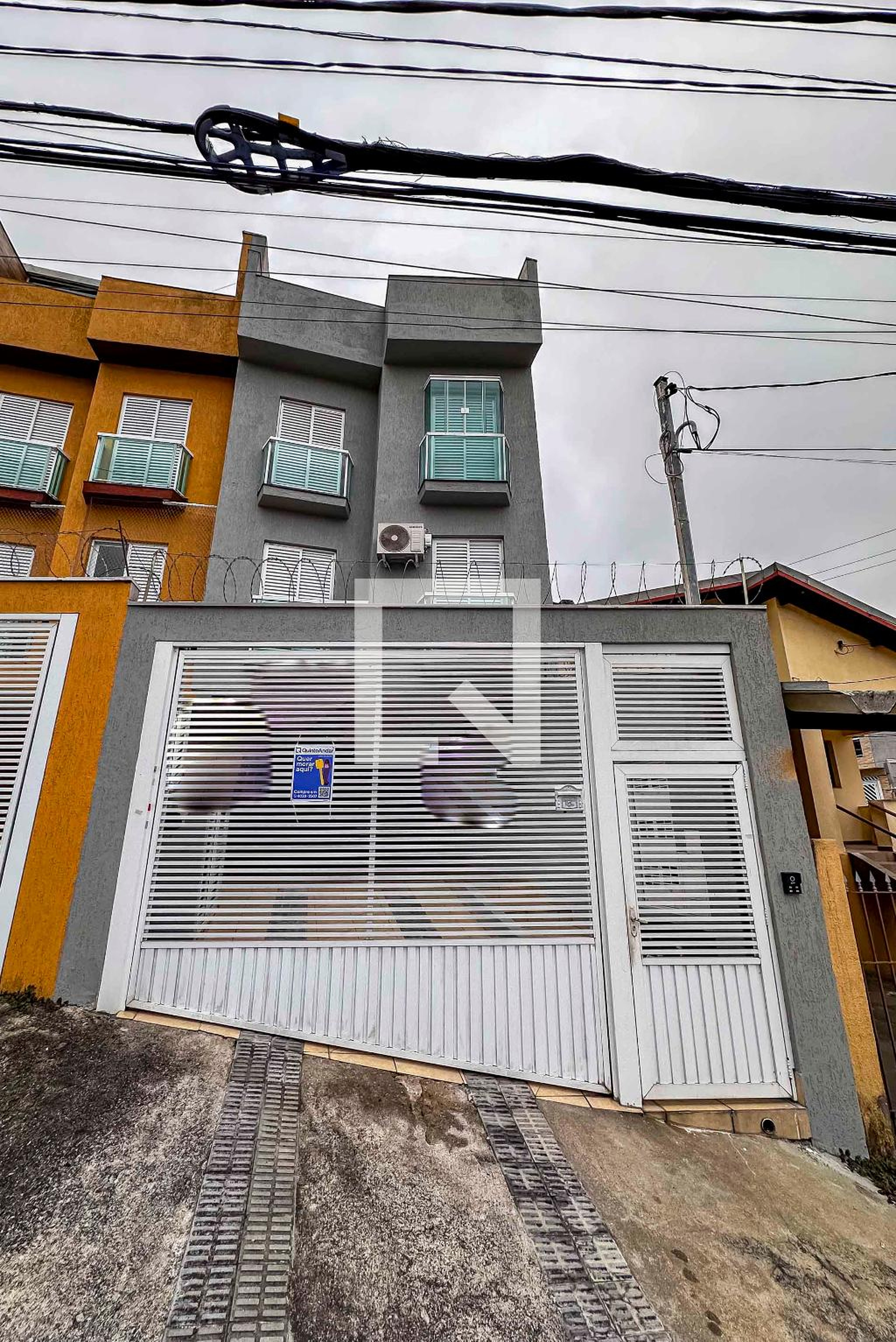 Fachada Condomínio em Rua Bororós, 237