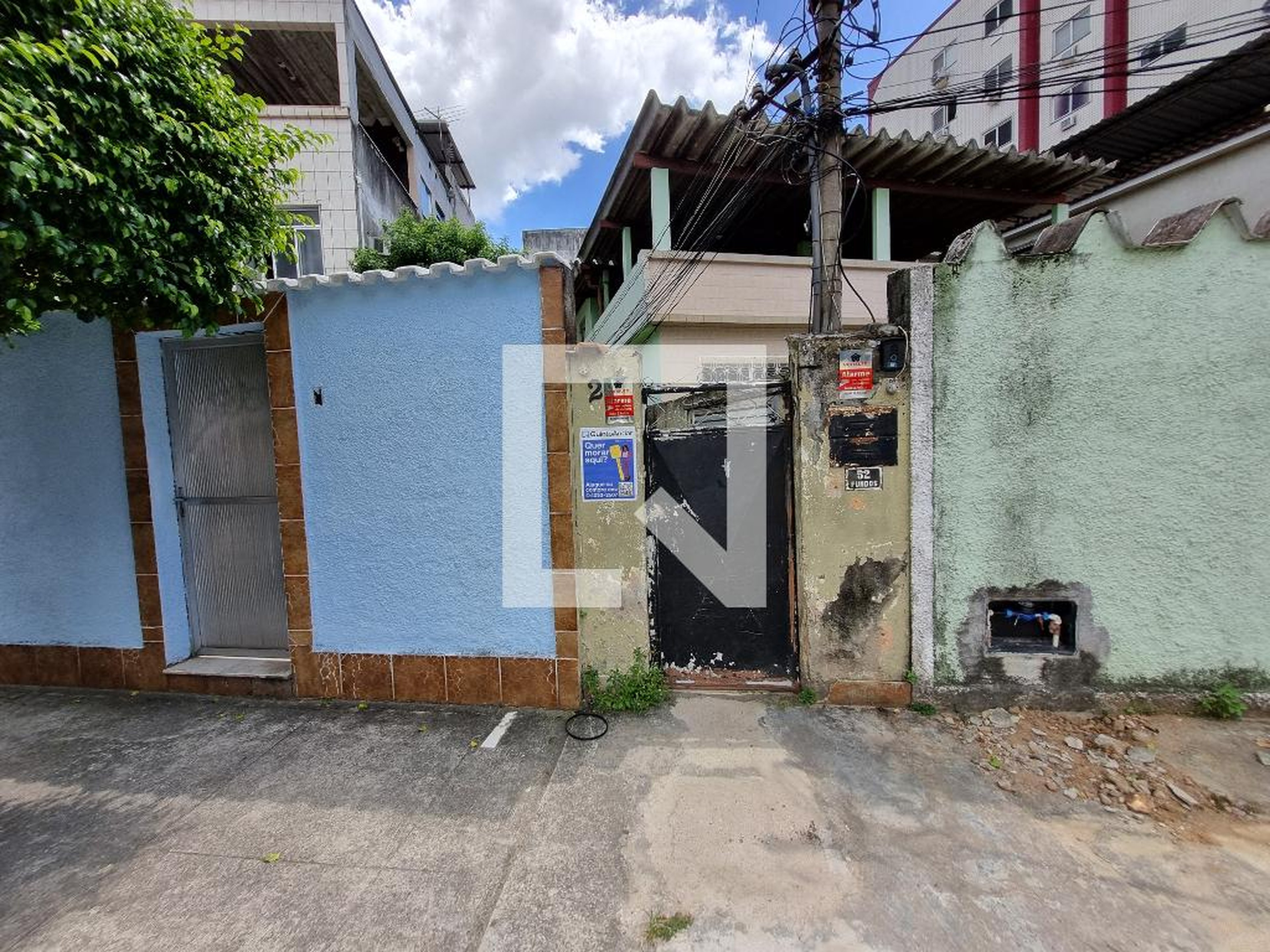 Entrada Condomínio em Rua Olímpio da Mota, 52