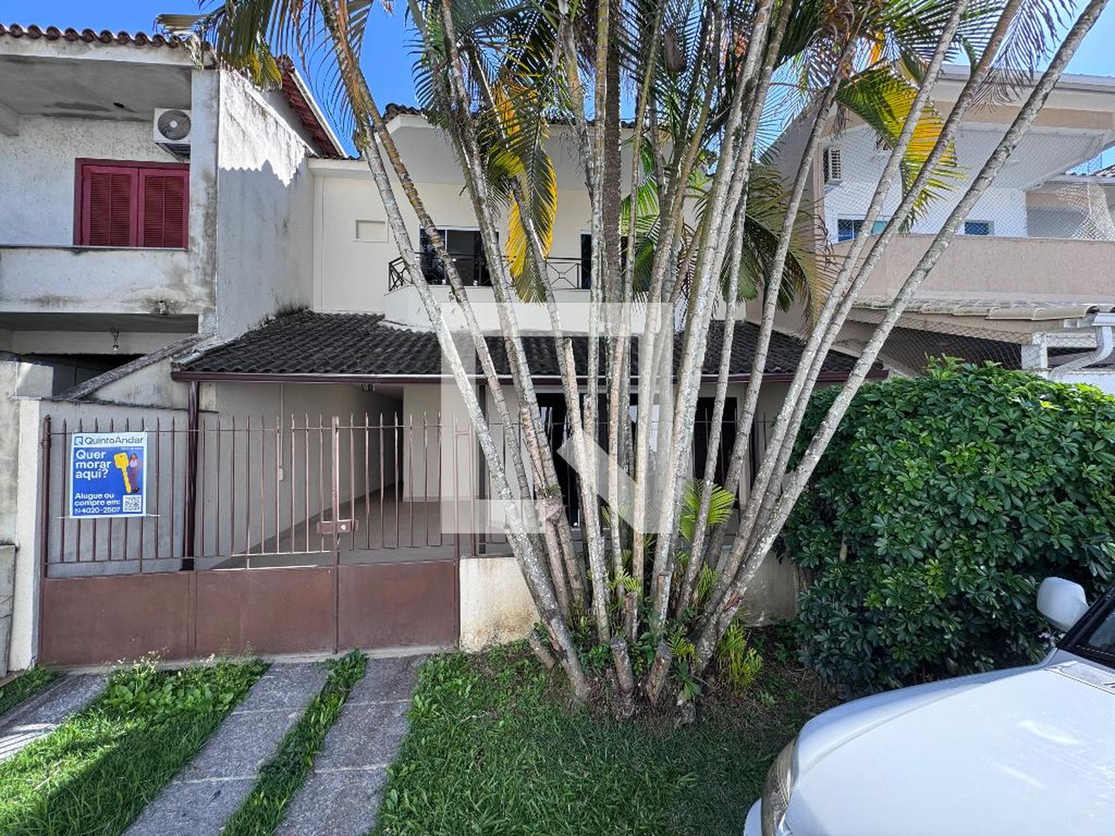 Fachada Condomínio em Rua Arthur Nepomuceno, 111