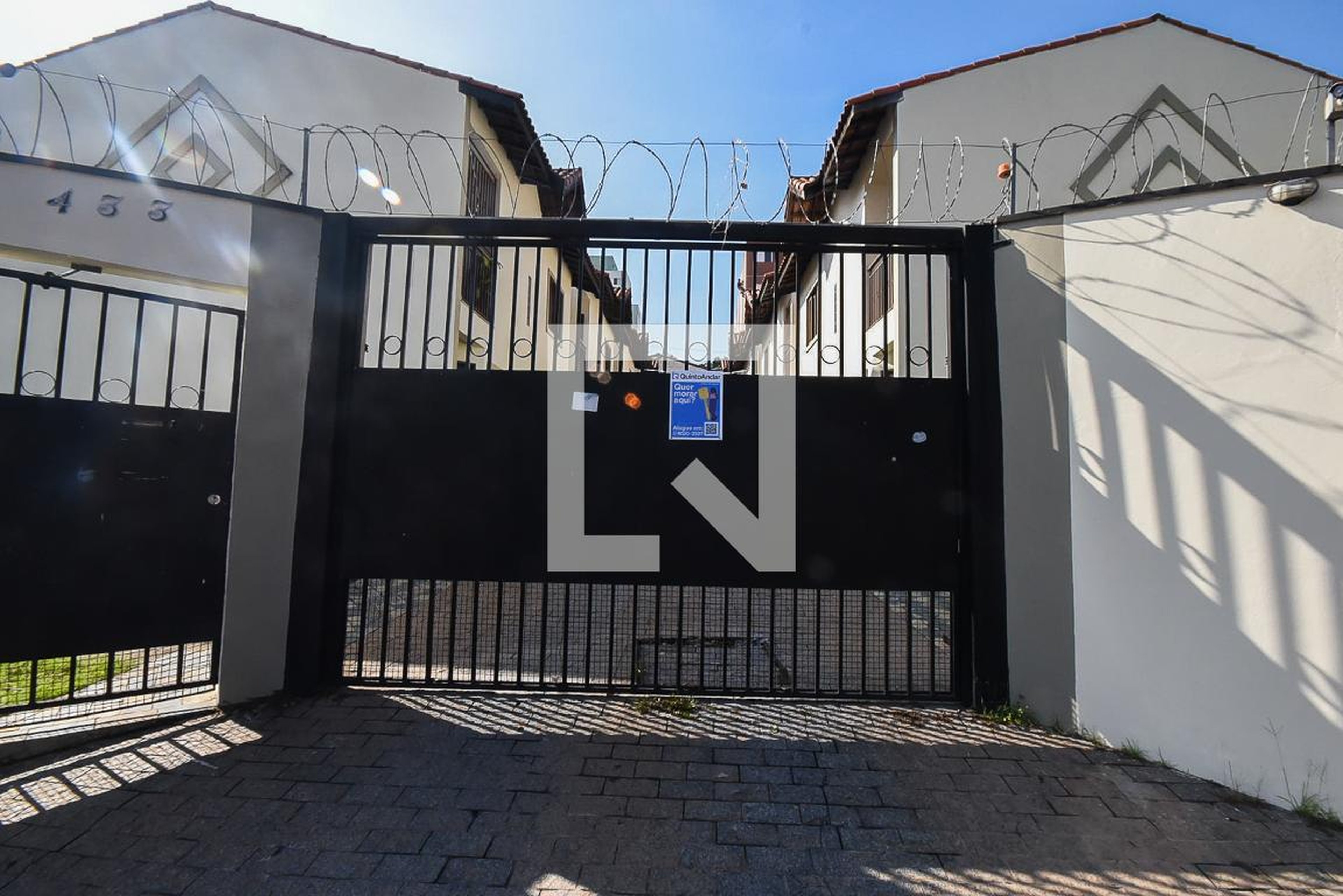 Fachada Condomínio em Rua Domingos Bicudo, 433