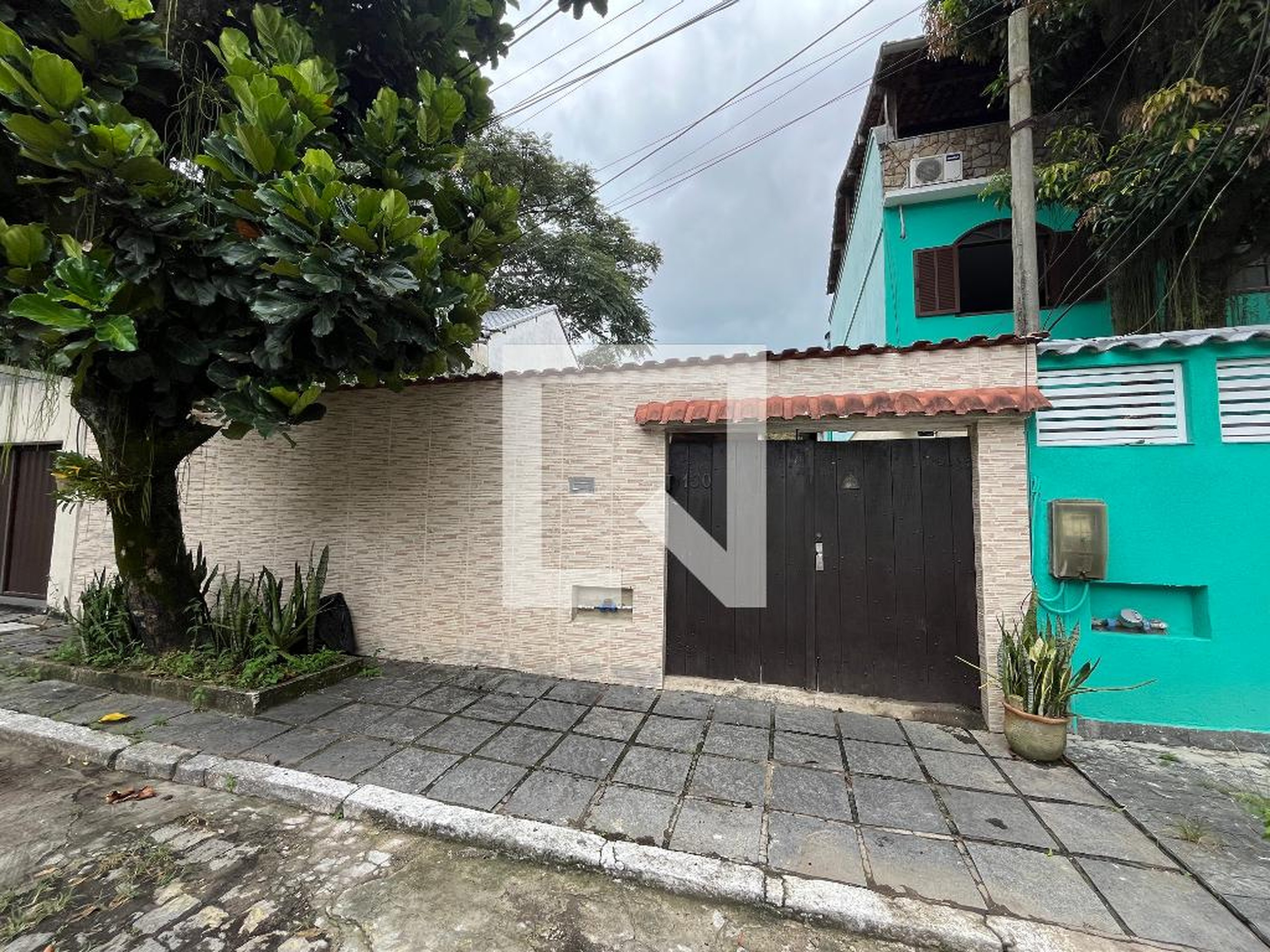 Fachada Condomínio em Rua Coronel Alberto Martins, 130