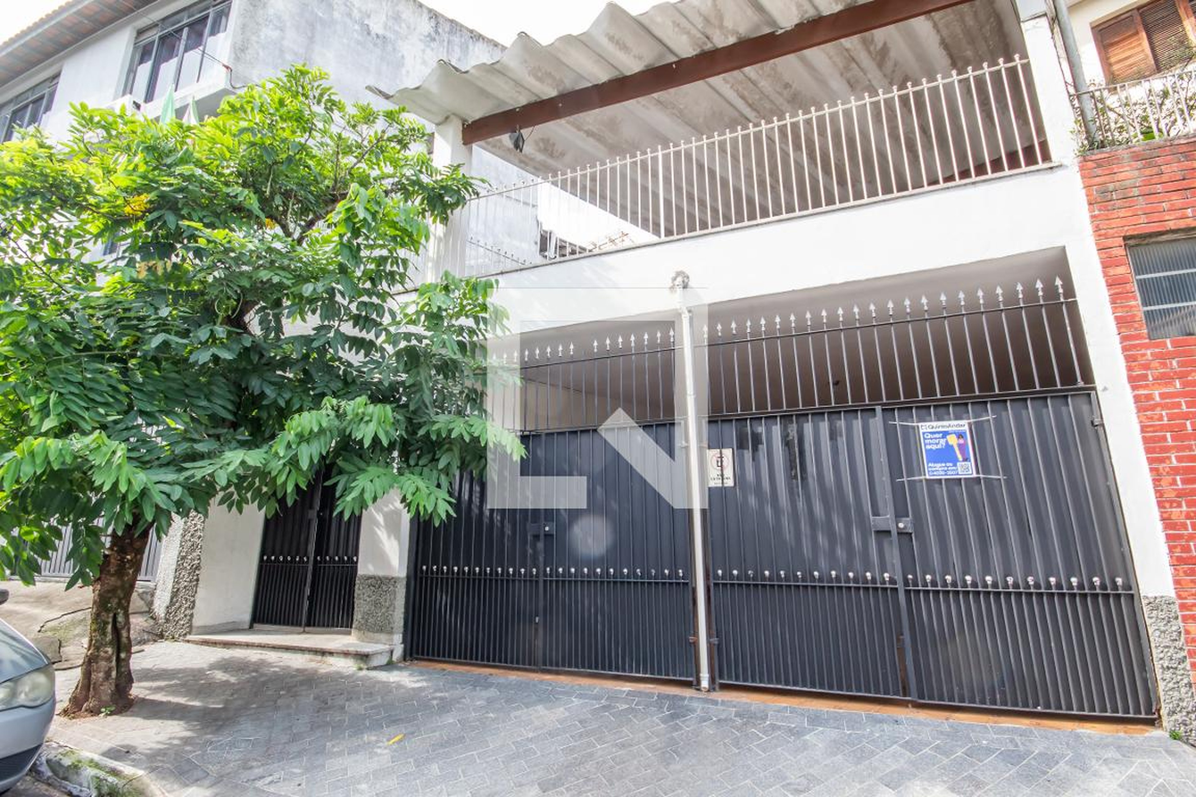 Fachada Condomínio em Rua Atílio Delanina, 311