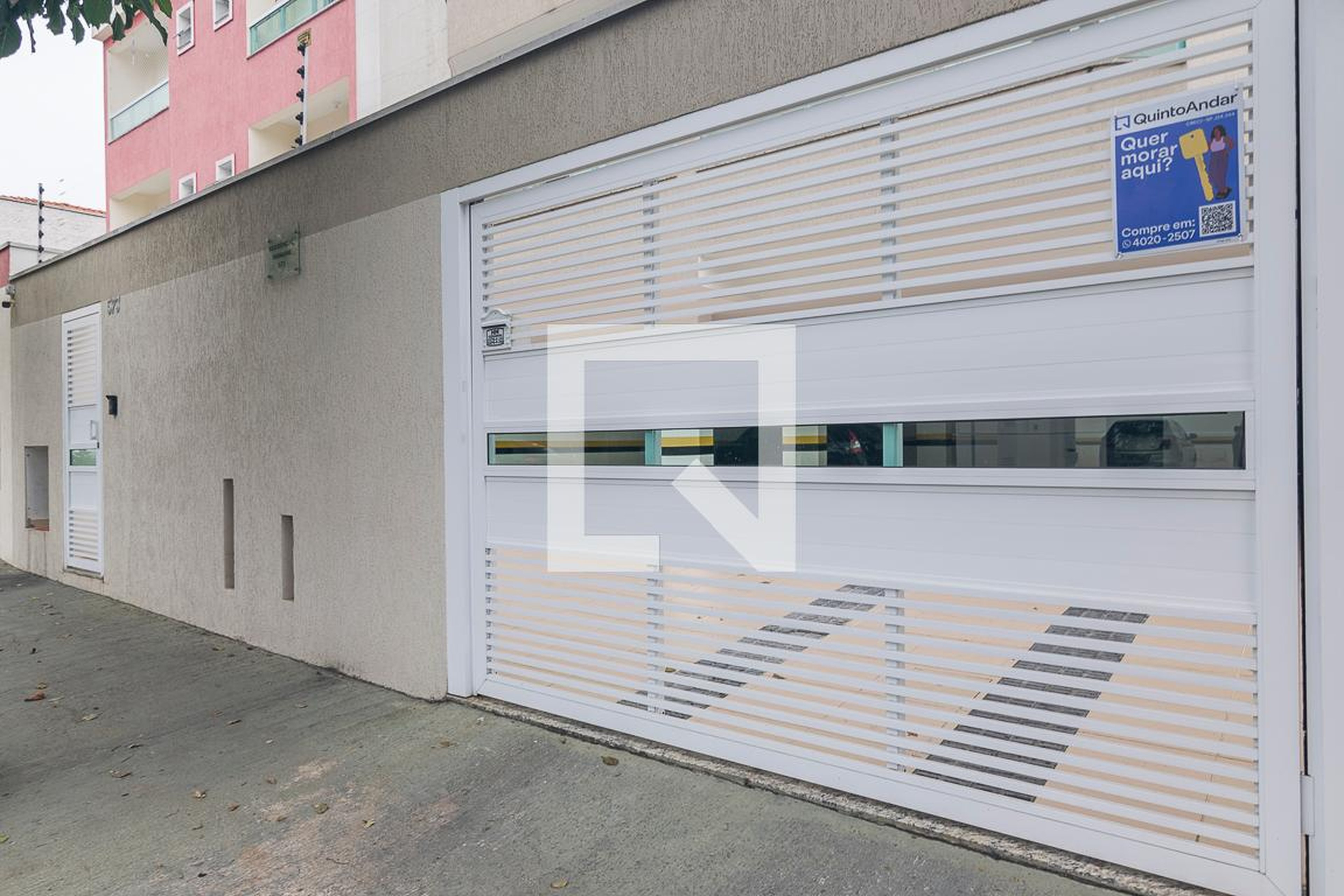 Fachada Condomínio em Rua Andarai, 573