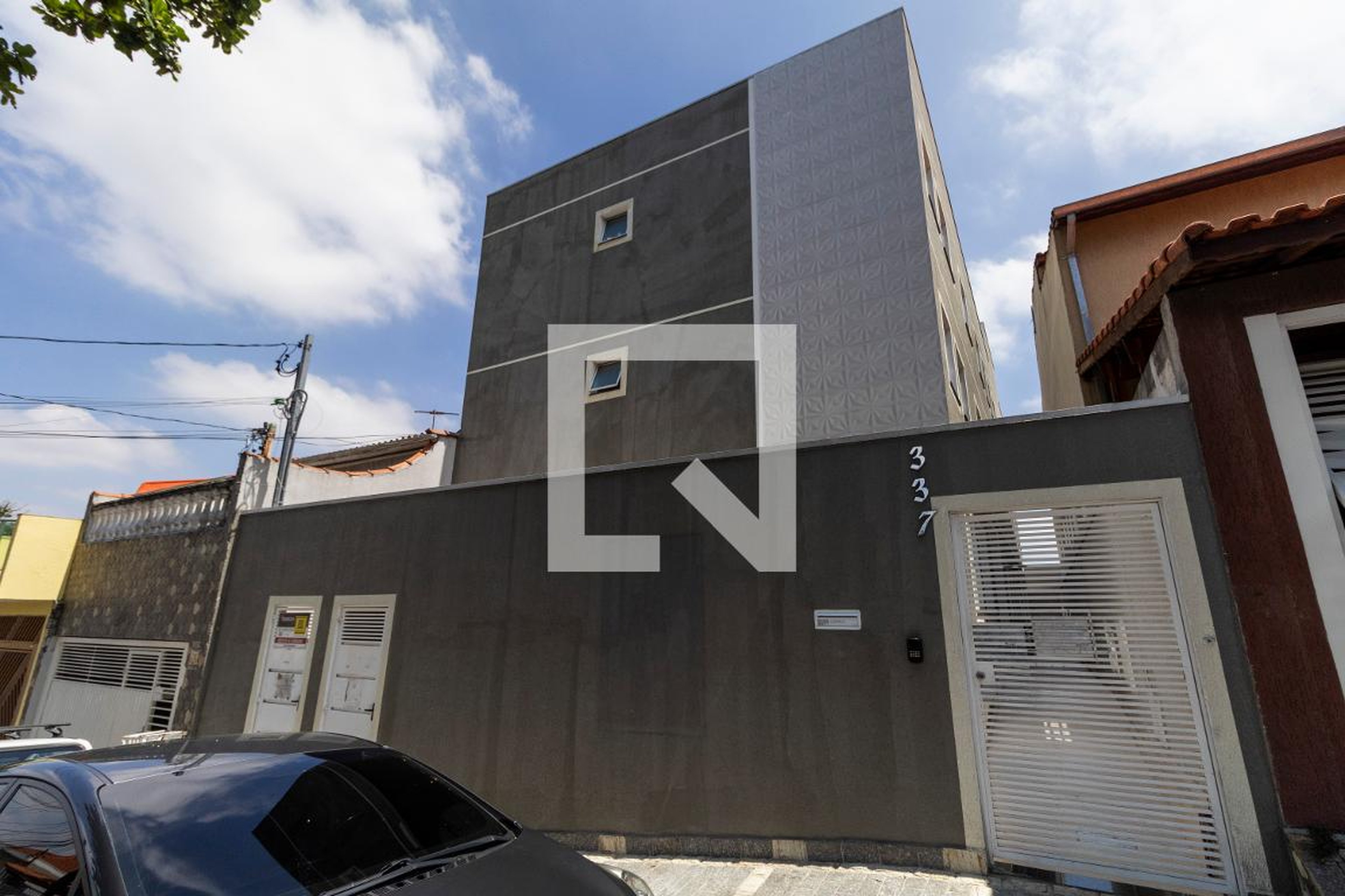 Fachada Condomínio em Rua Jacinto de Lima Santos, 337