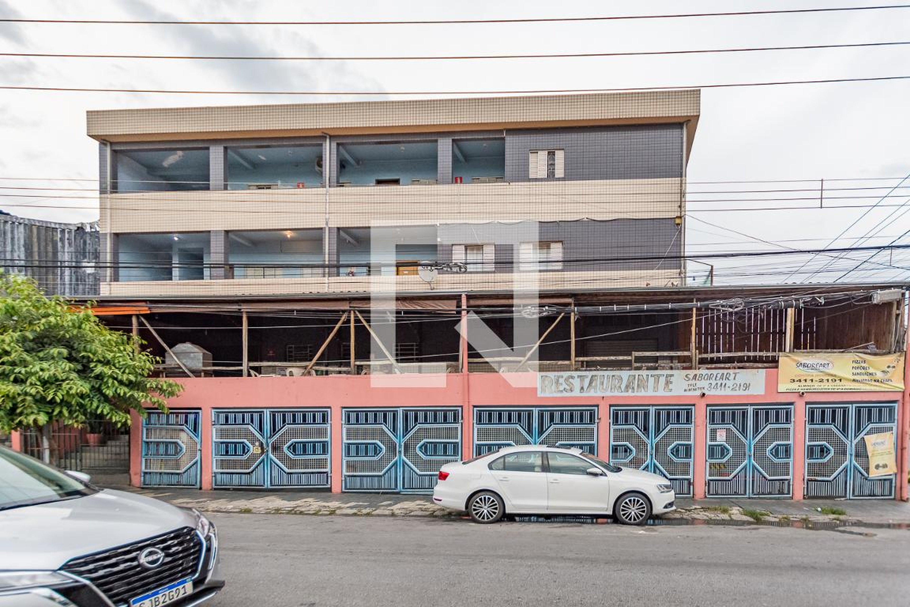 Fachada Condomínio em Rua Alípio de Melo, 348