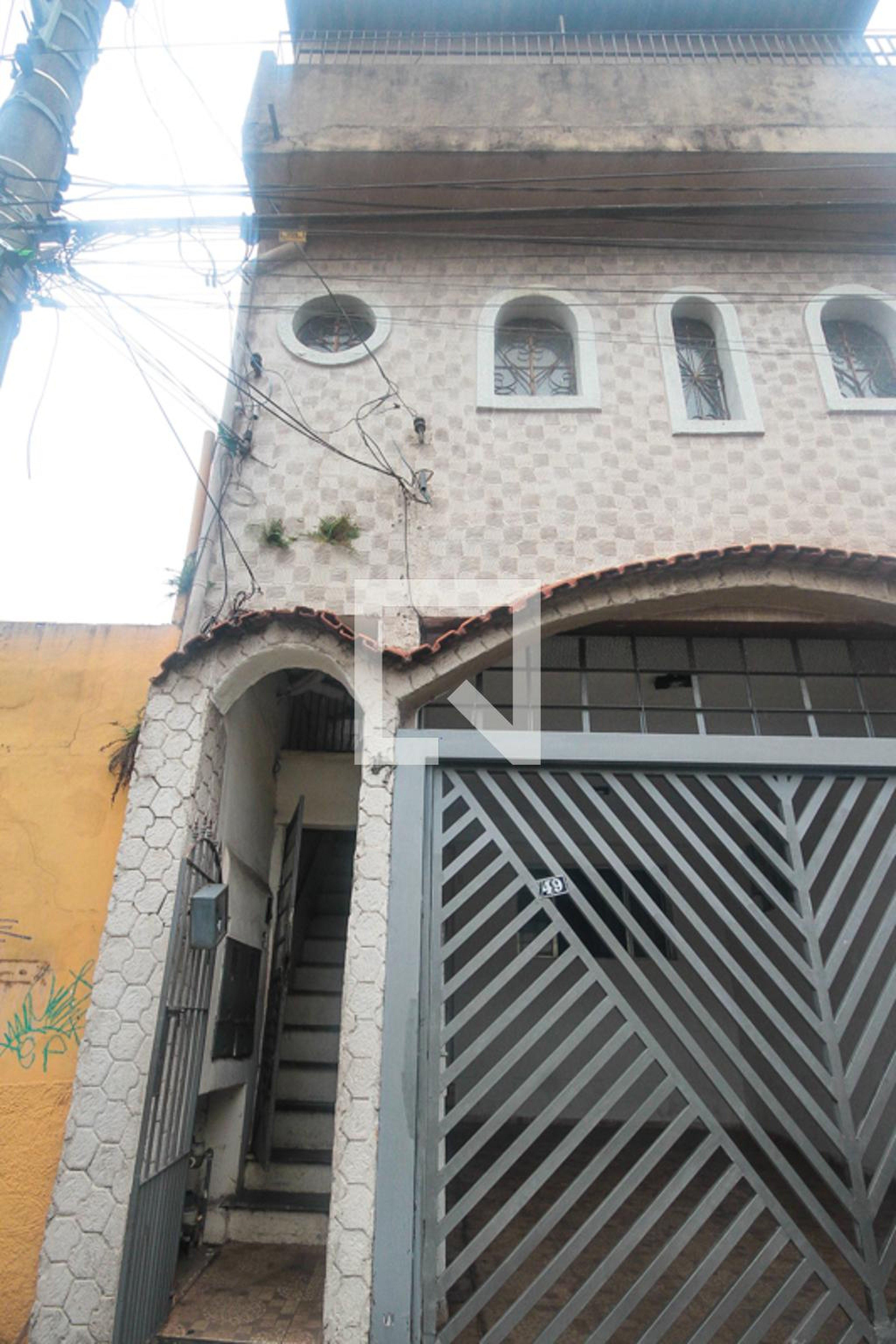 Fachada Condomínio em Rua Angá, 47