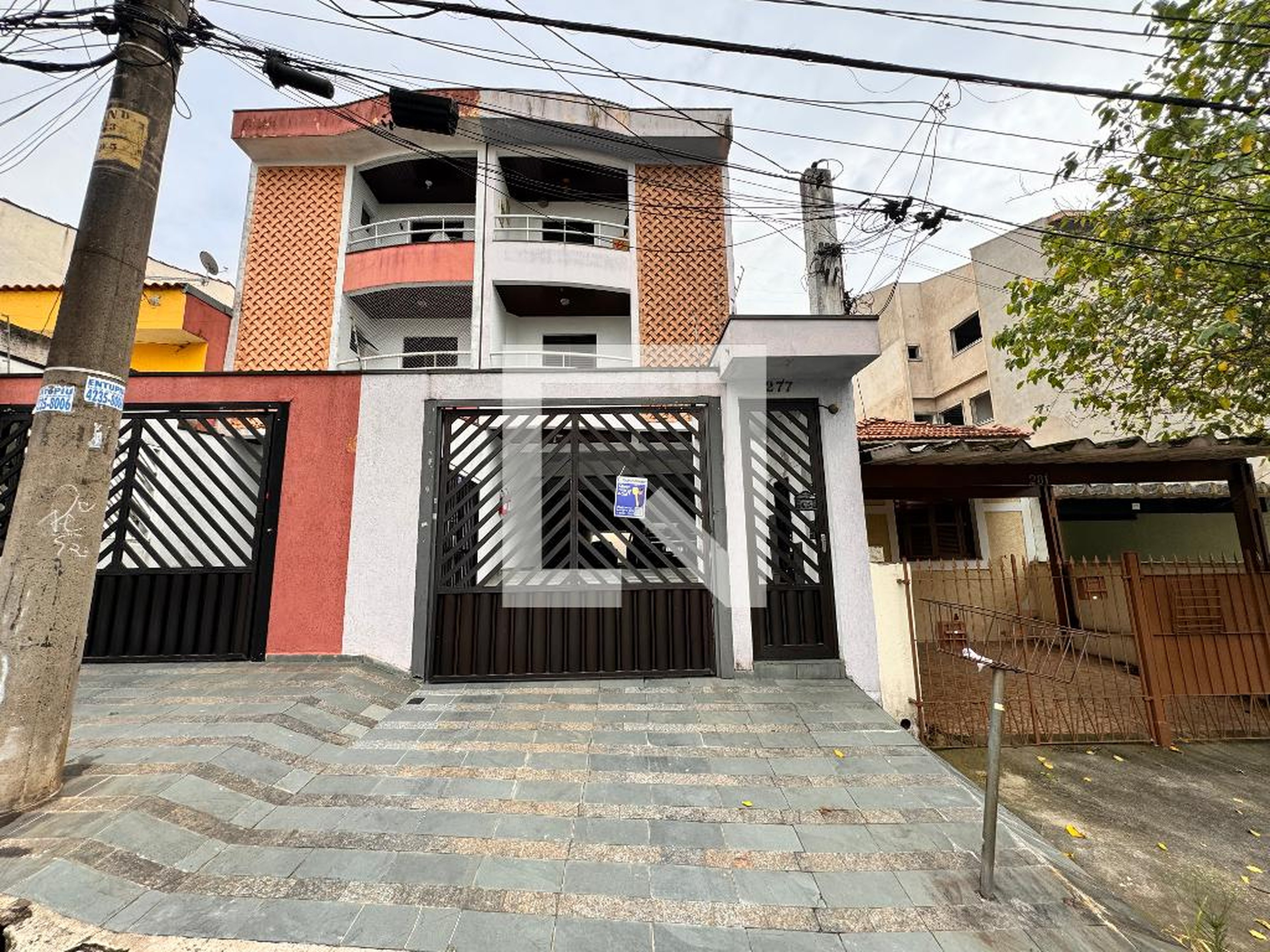 Fachada Condomínio em Rua Miguel Couto, 277