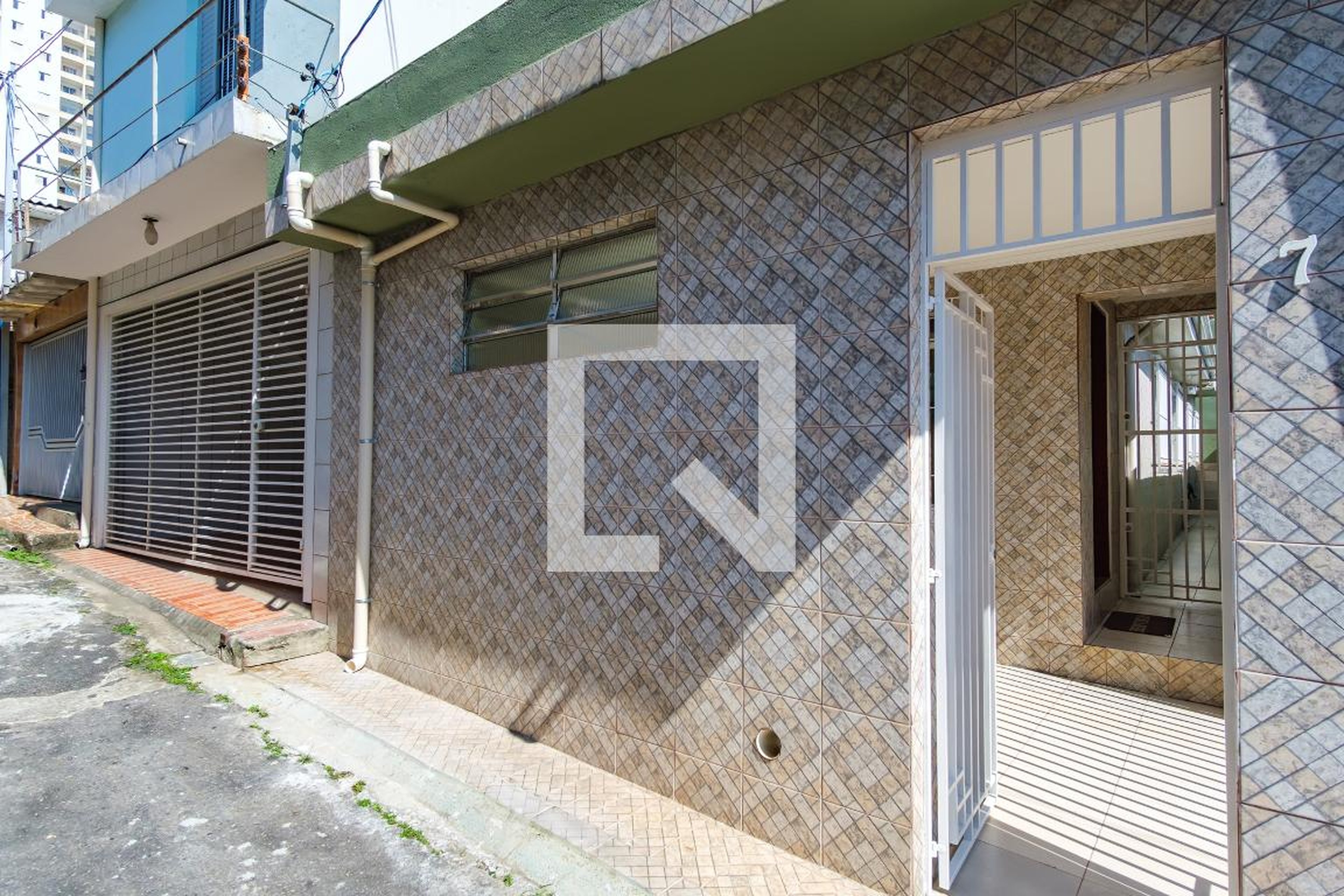 Fachada Condomínio em Rua Maniutuba, 143