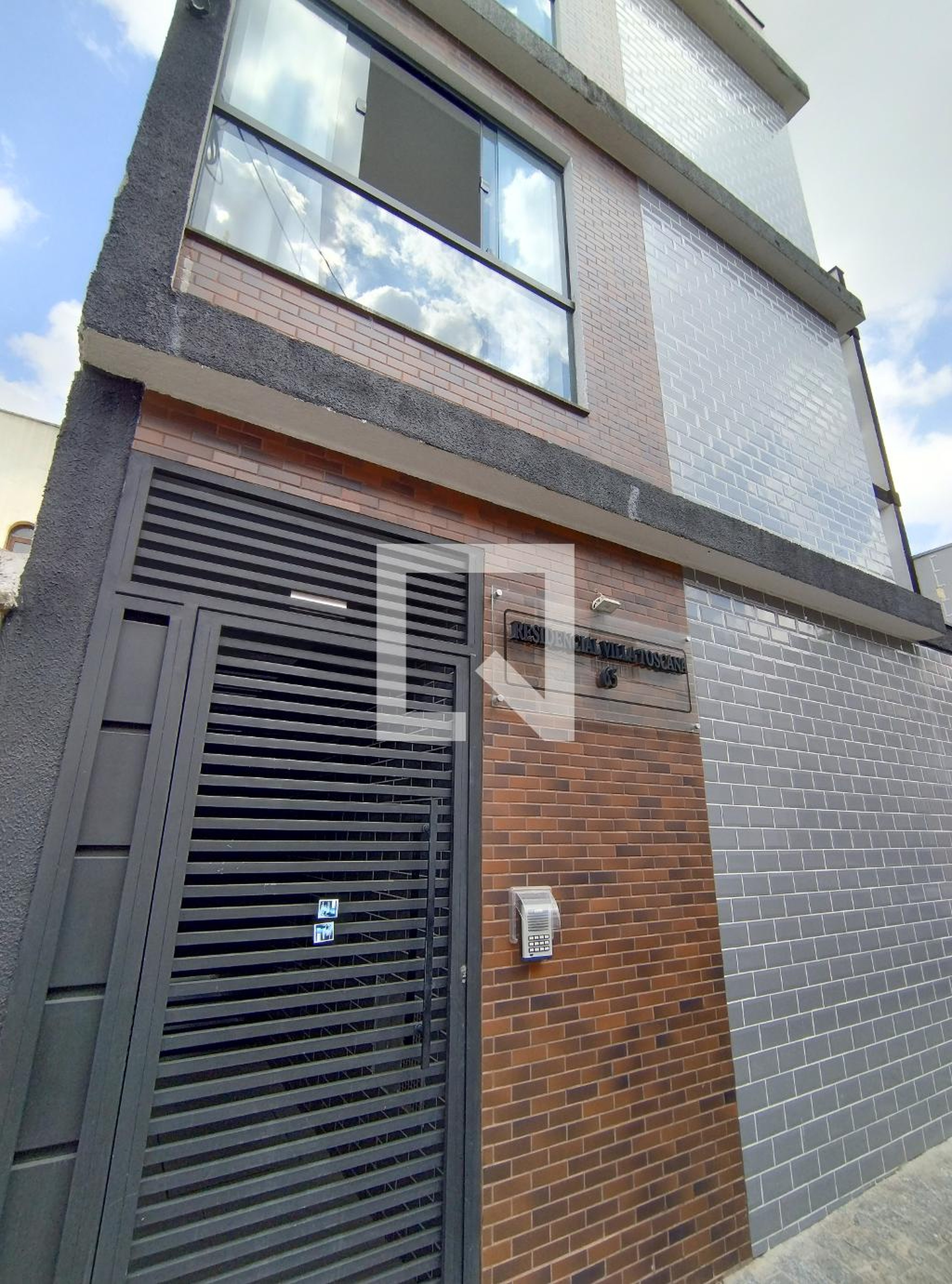 Fachada Condomínio Villa Toscana