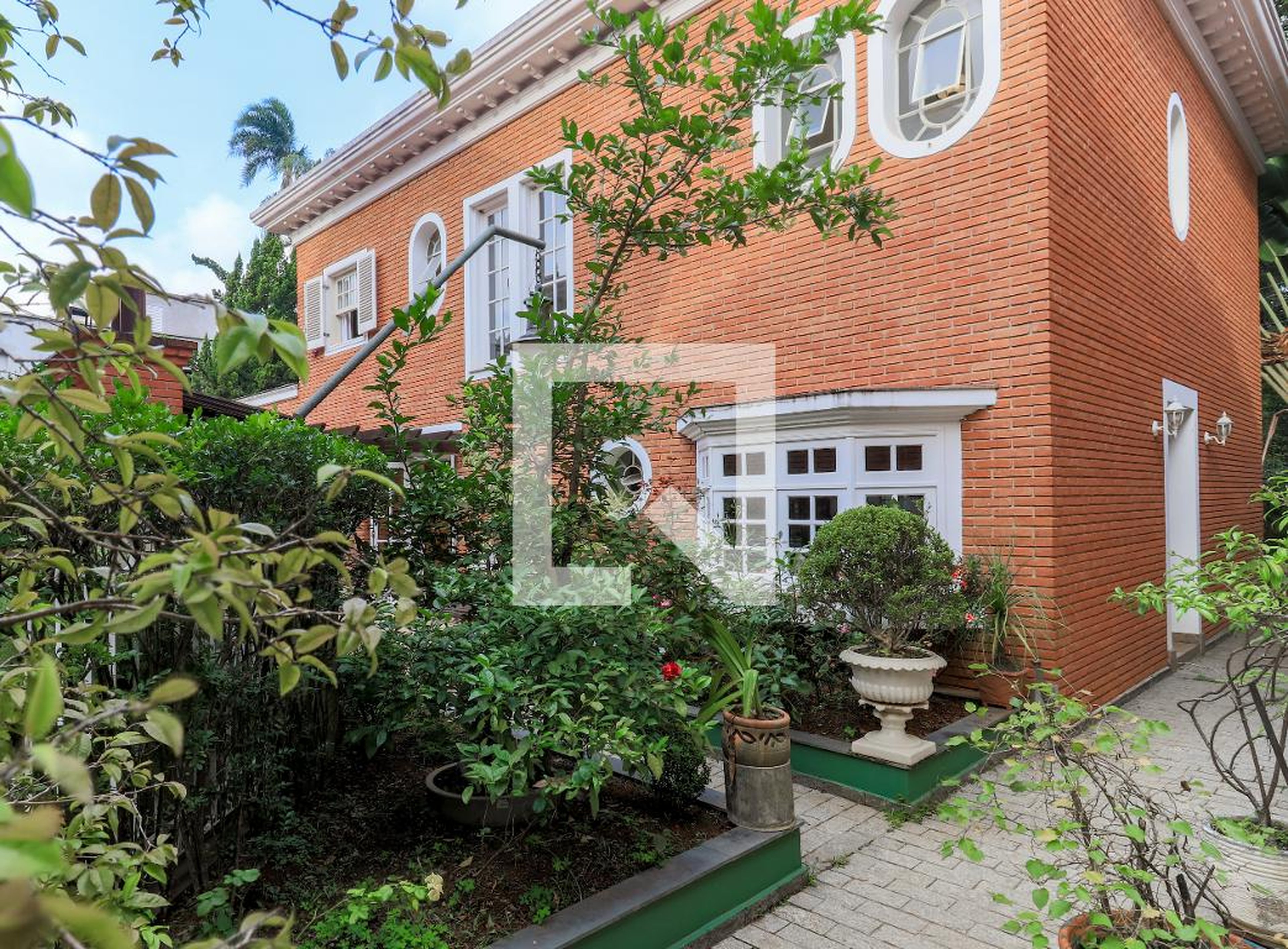 Fachada Condomínio English Villagge