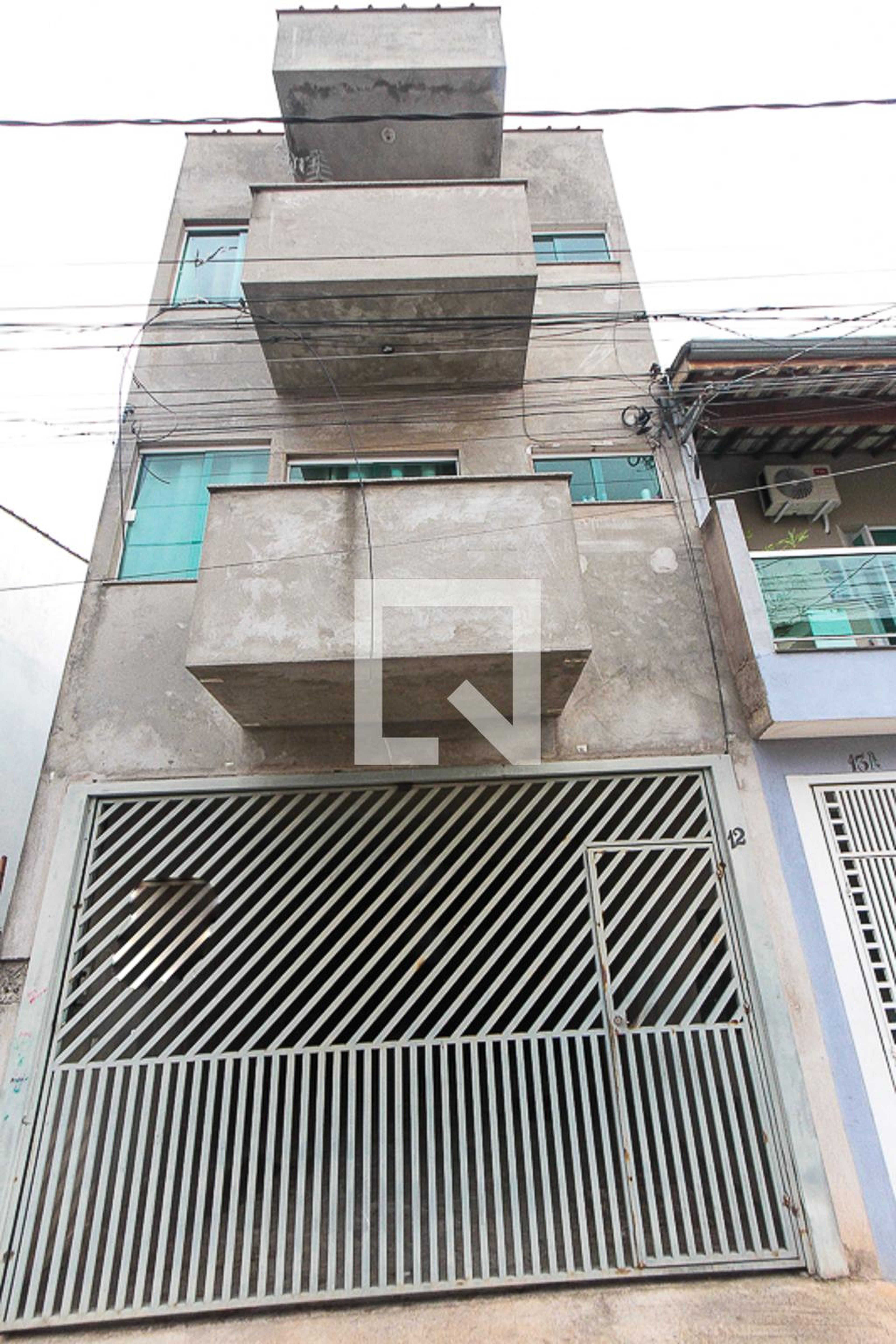 Fachada Condomínio em Rua José Roberto de Alencar, 12