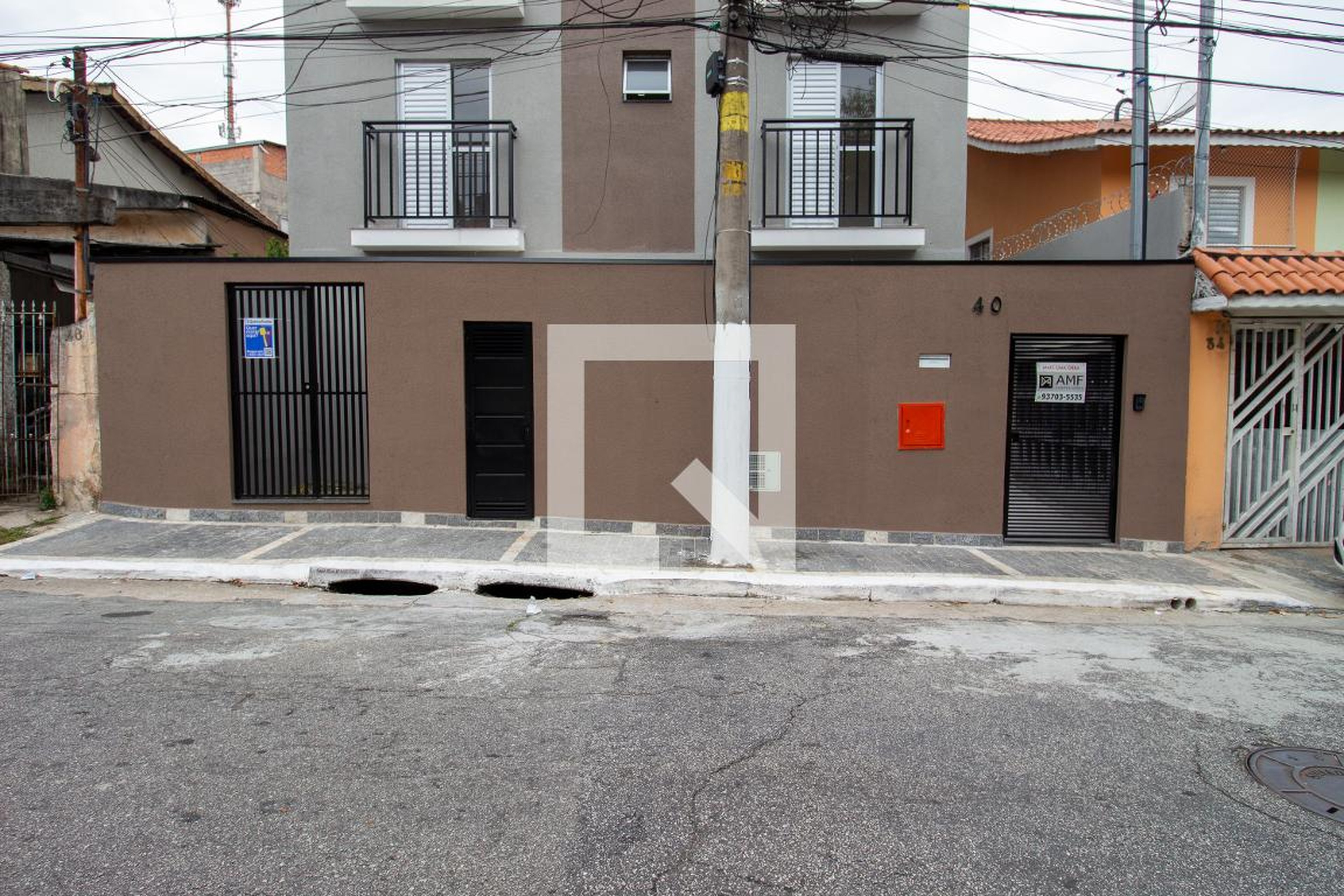 Fachada Condomínio em Rua Benjamim do Monte, 40