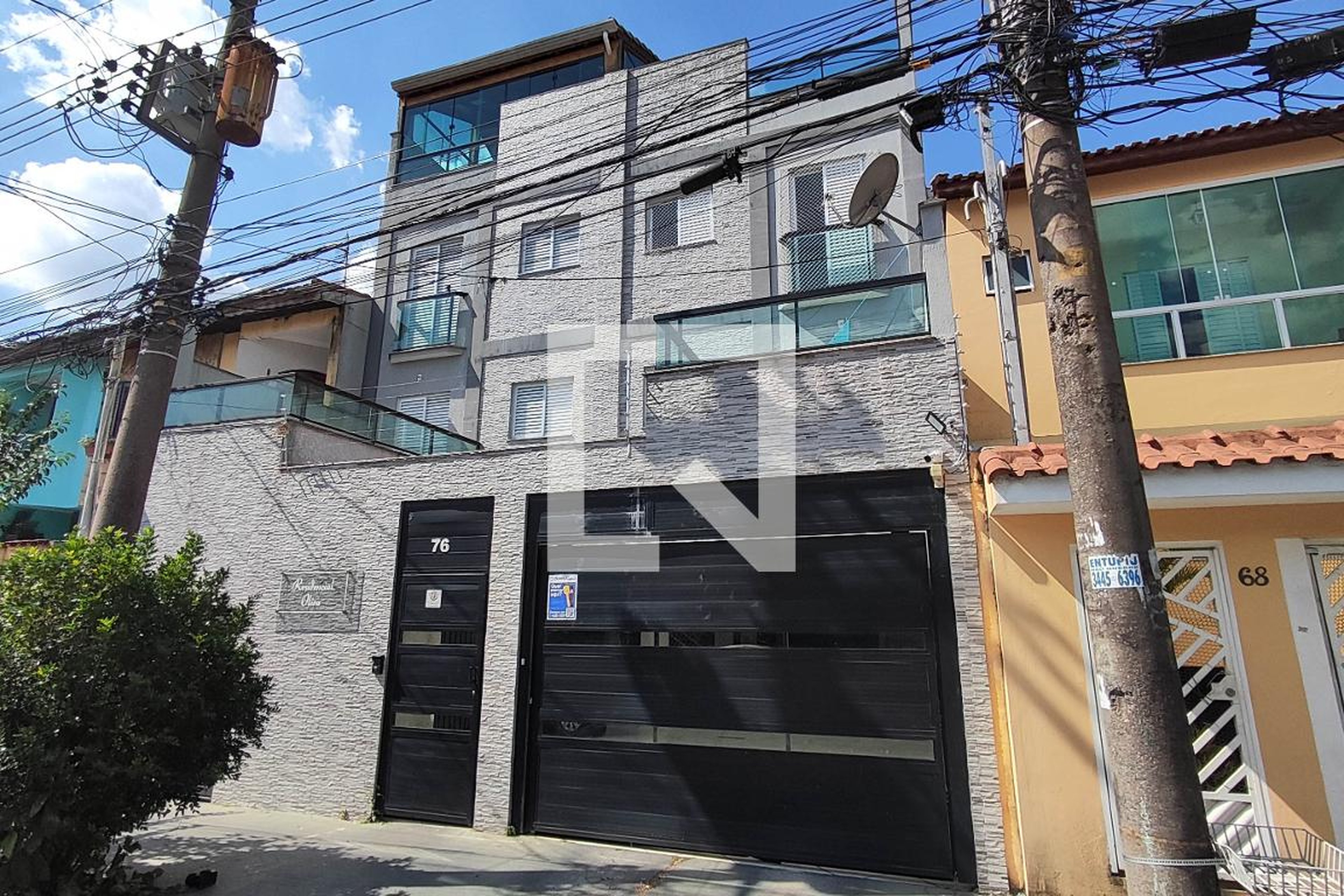 Fachada Condomínio em Rua Curitiba, 76