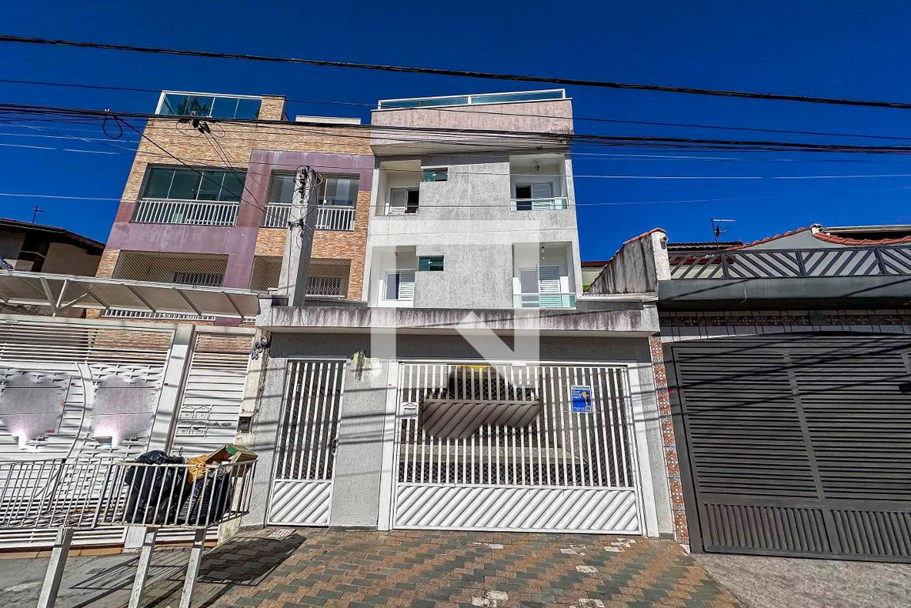 Fachada Condomínio em Rua Igino Scarpelli, 456