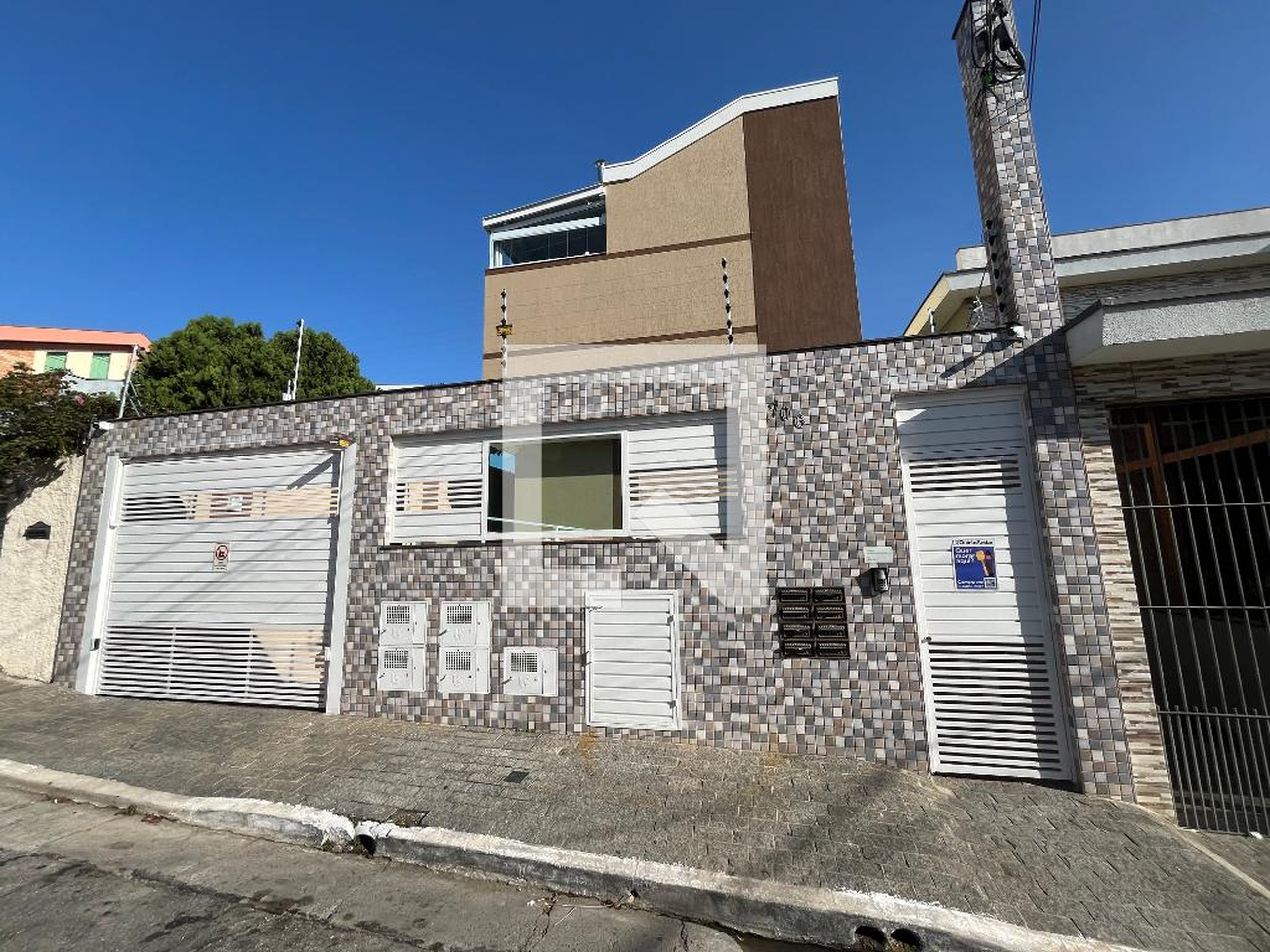 Fachada Condomínio em Rua Carlito, 706