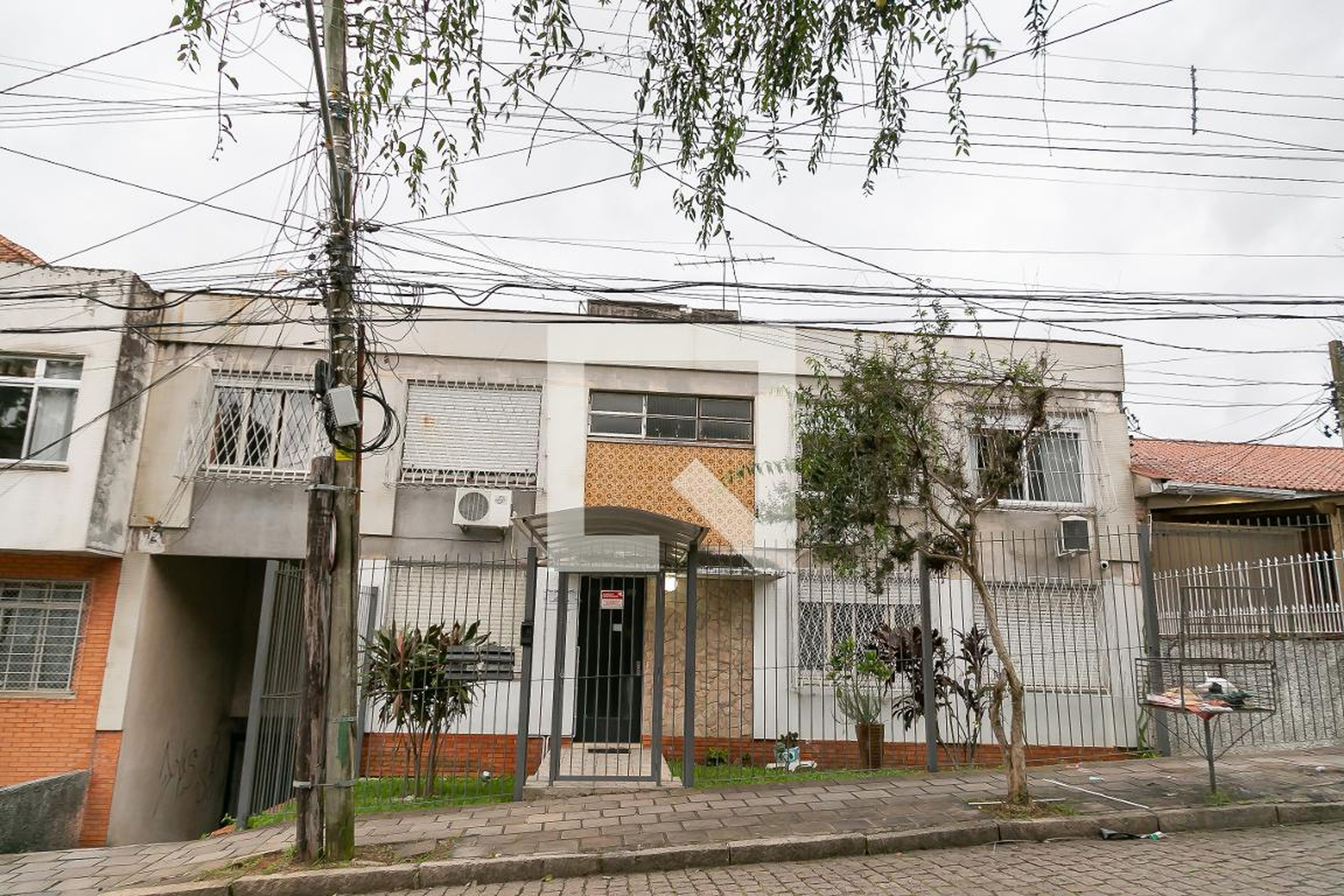 Fachada Condomínio em Rua Doutor Voltaire Pires, 860