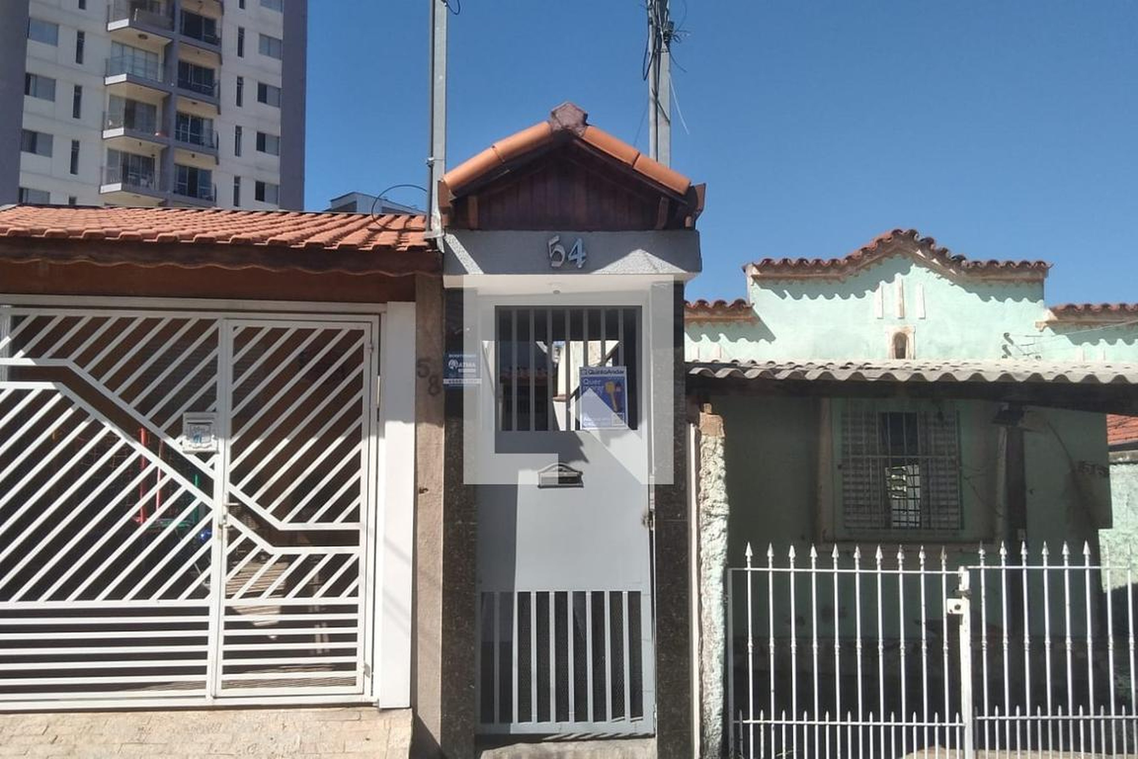 Fachada Condomínio em Rua Dias de Aguiar, 54