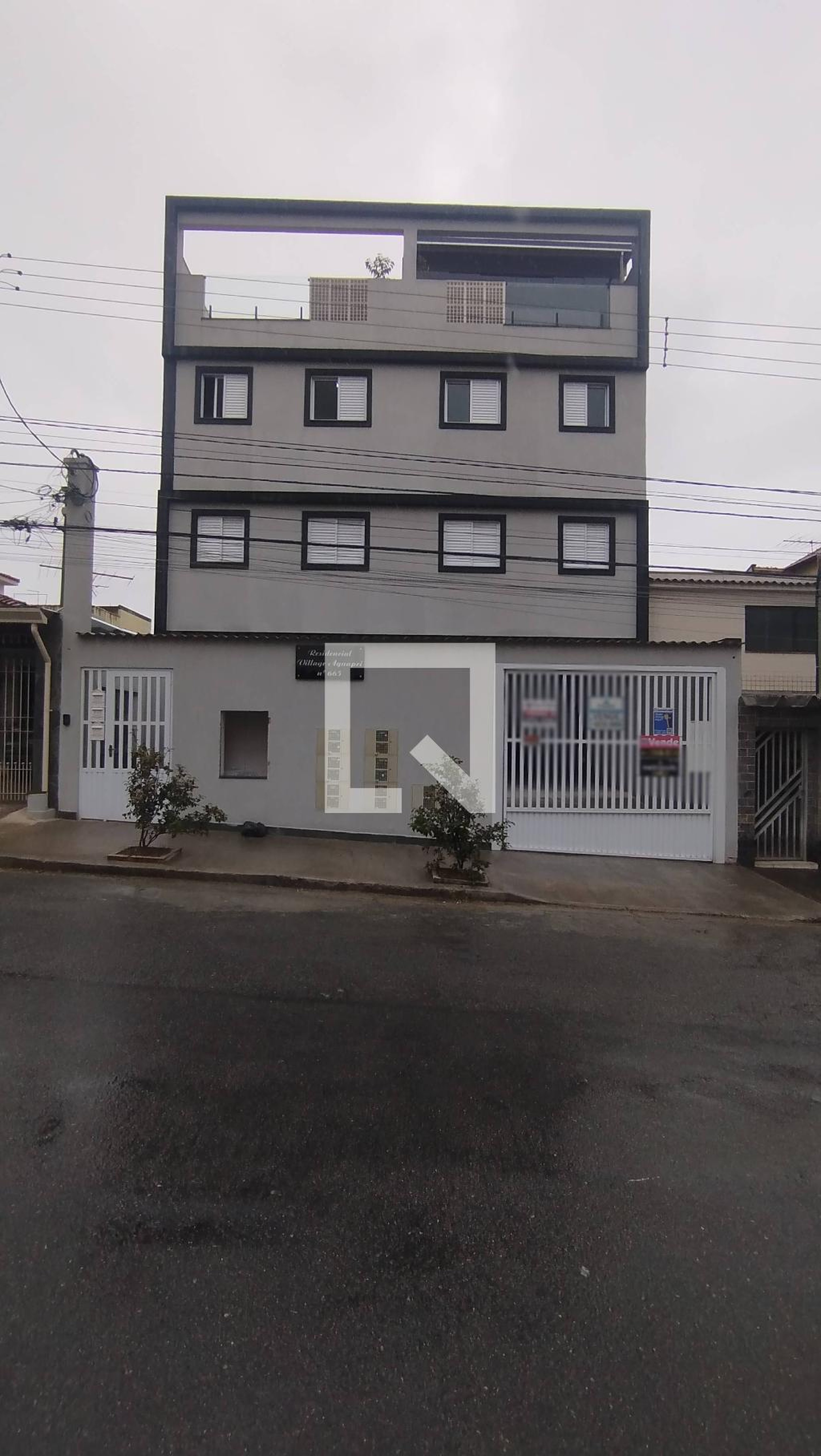 Fachada Condomínio Village Aguapei