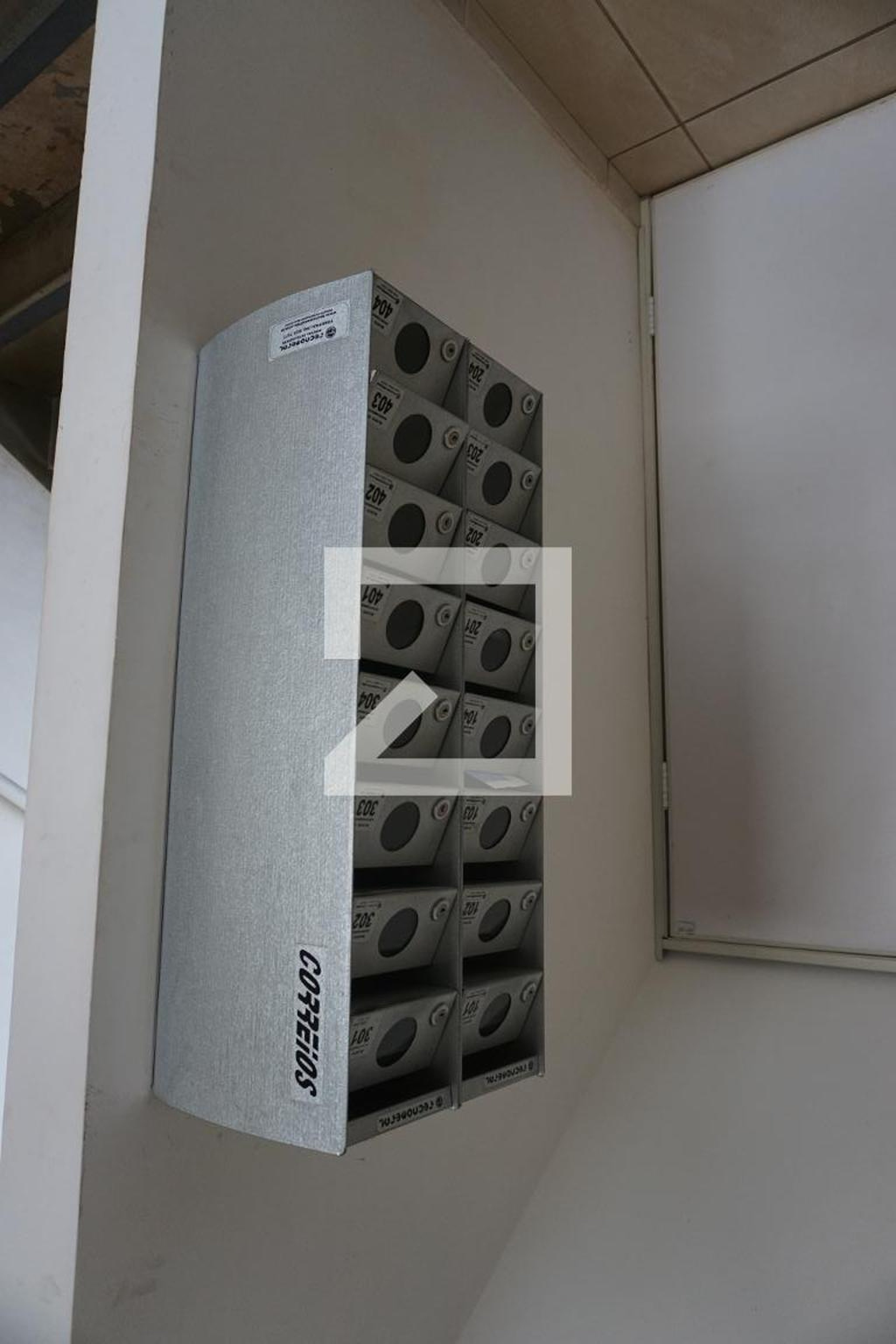 Hall de entrada Condomínio Campos Verdes