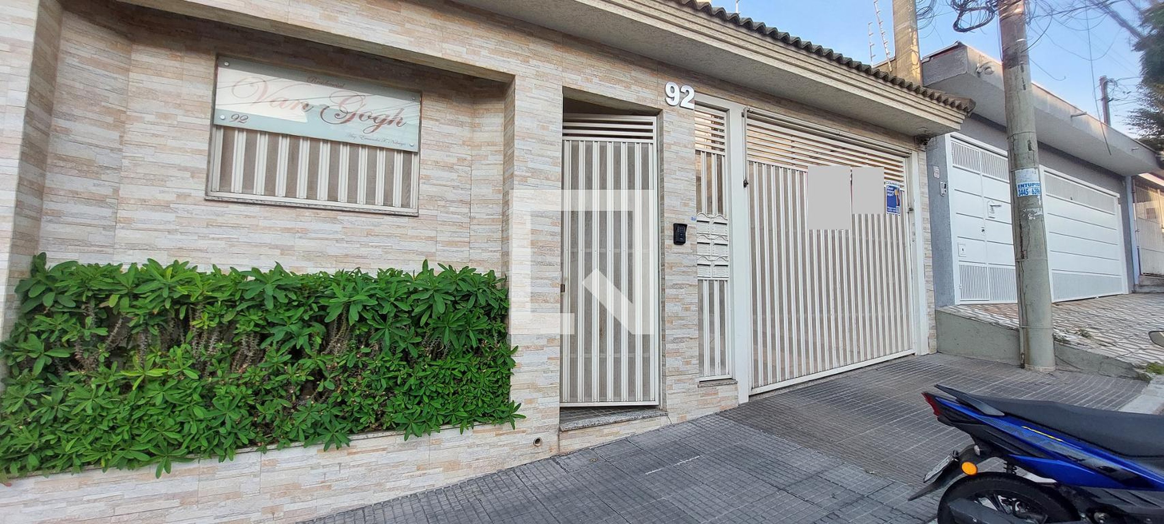 Fachada Condomínio em Rua Milão, 92