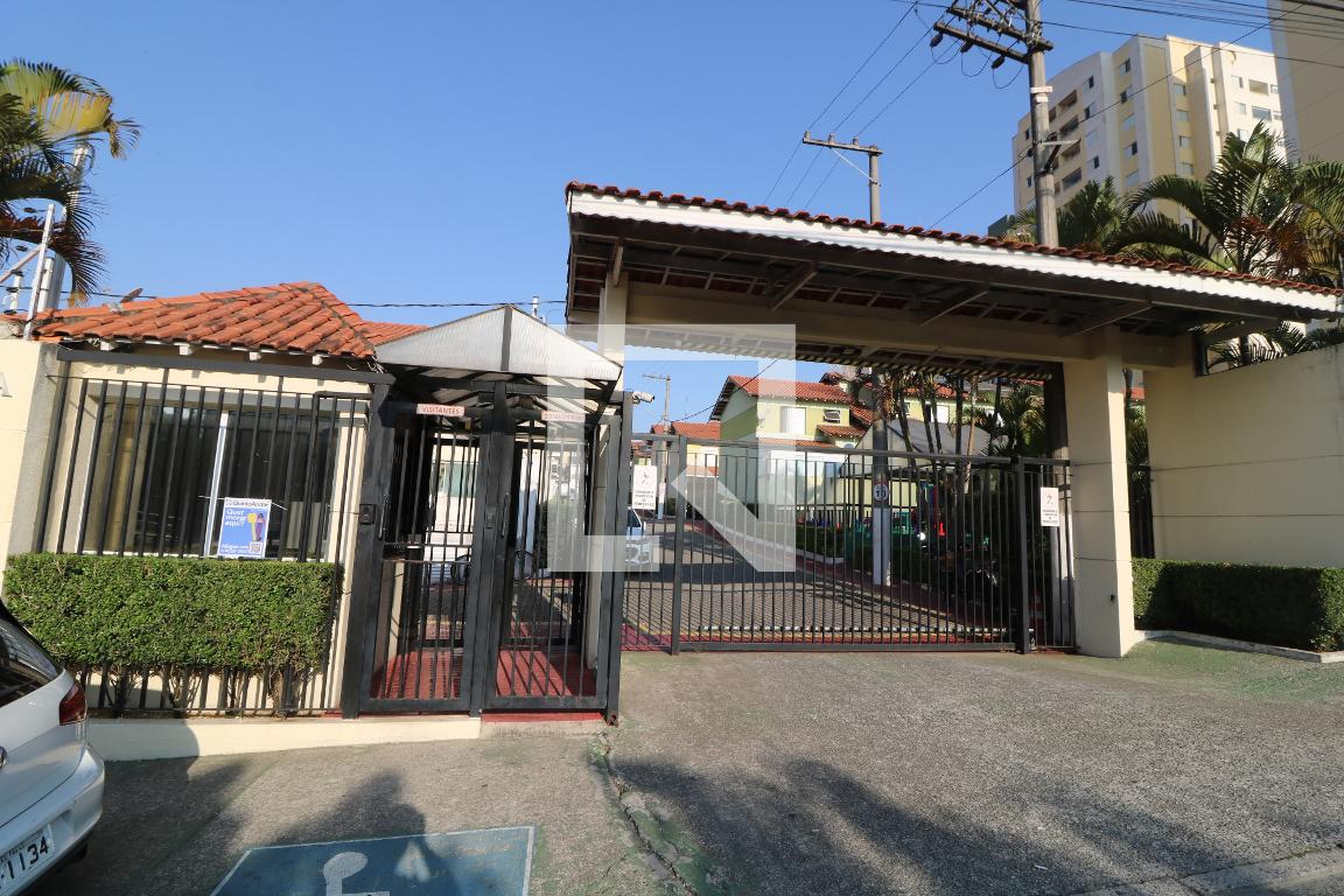 Fachada Condomínio em Rua Pacheco Gato, 179