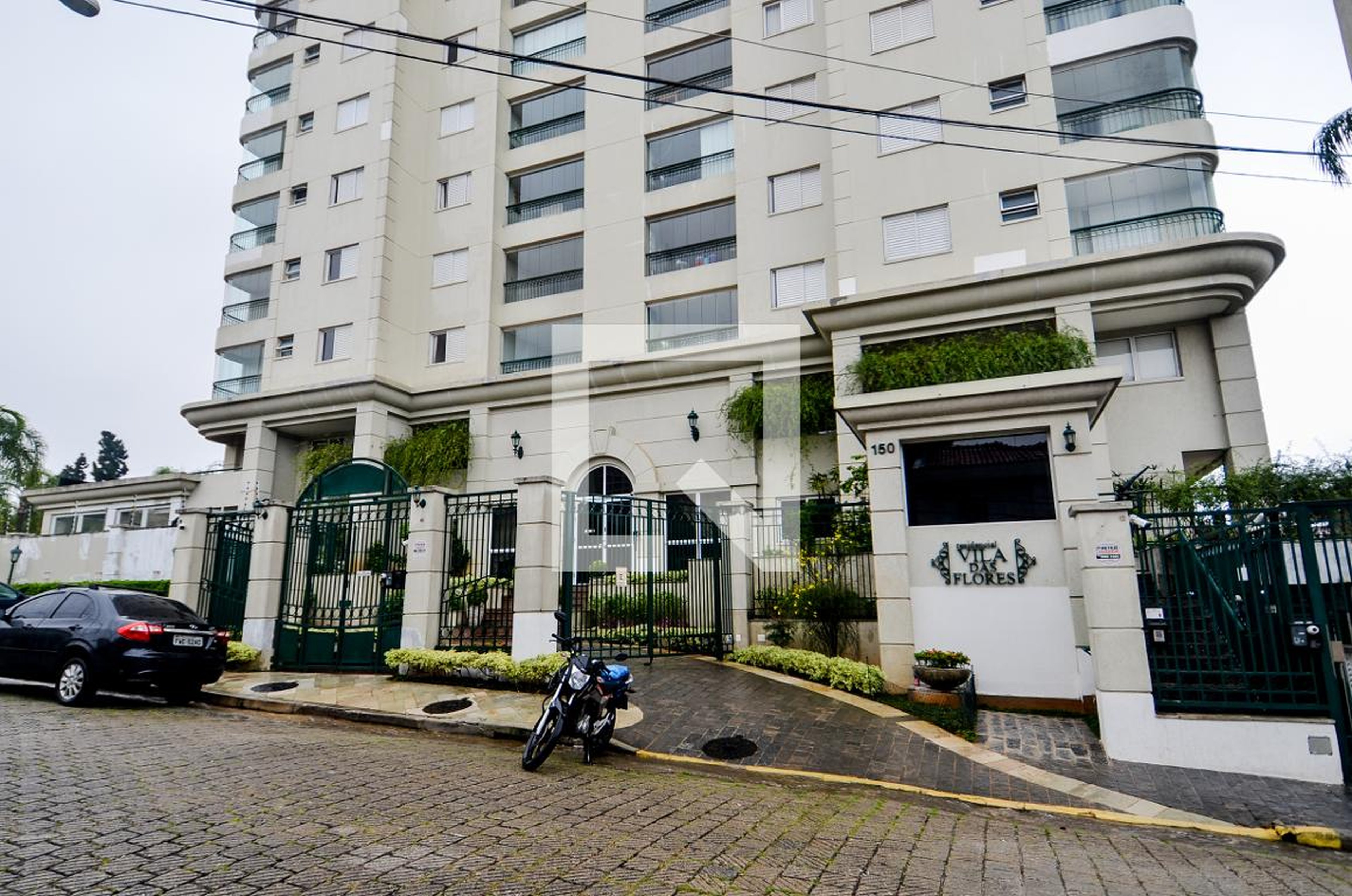 Fachada do Condomínio Condomínio Villa das Flores