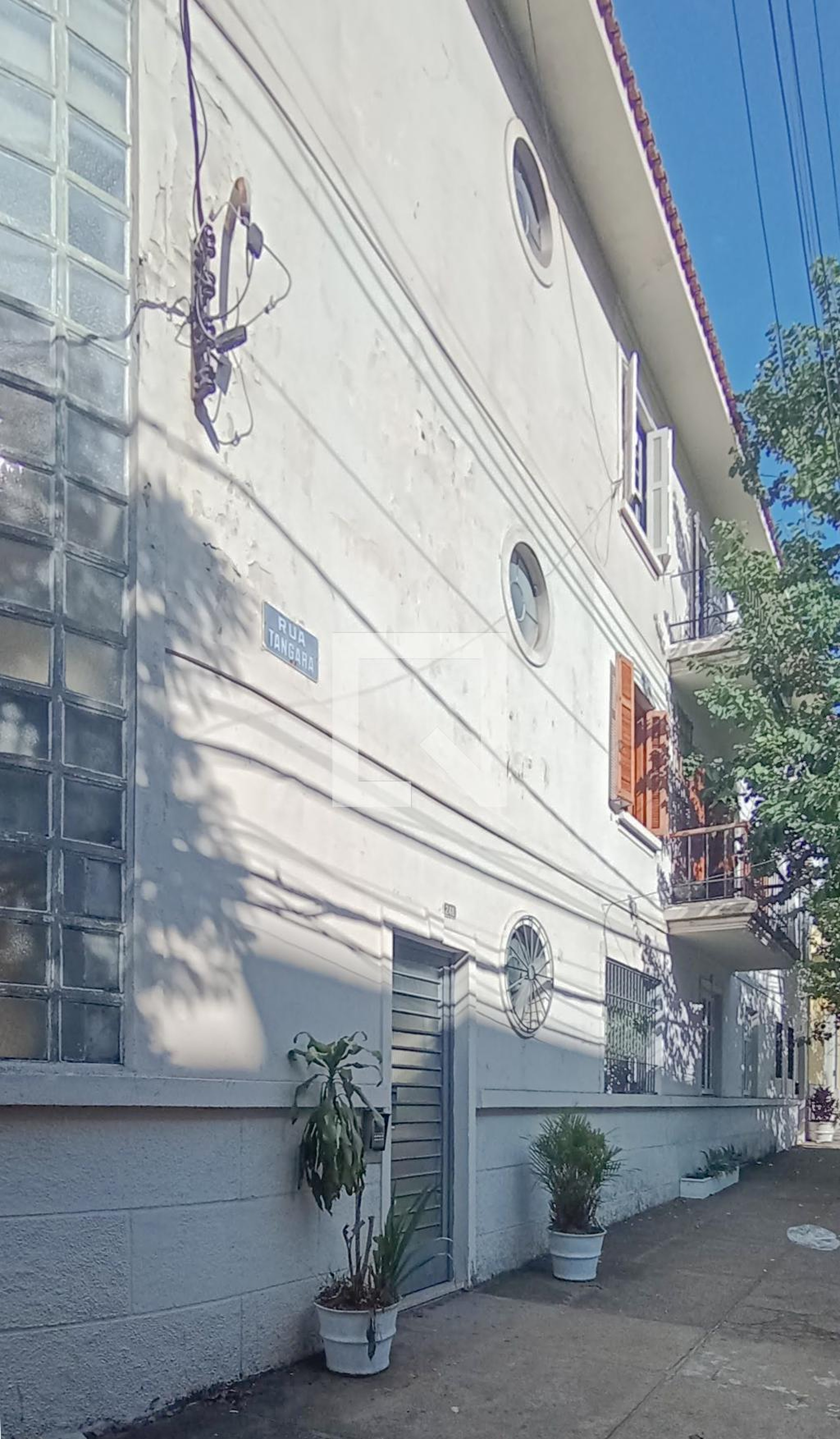 Fachada Condomínio em Rua Tangará, 248