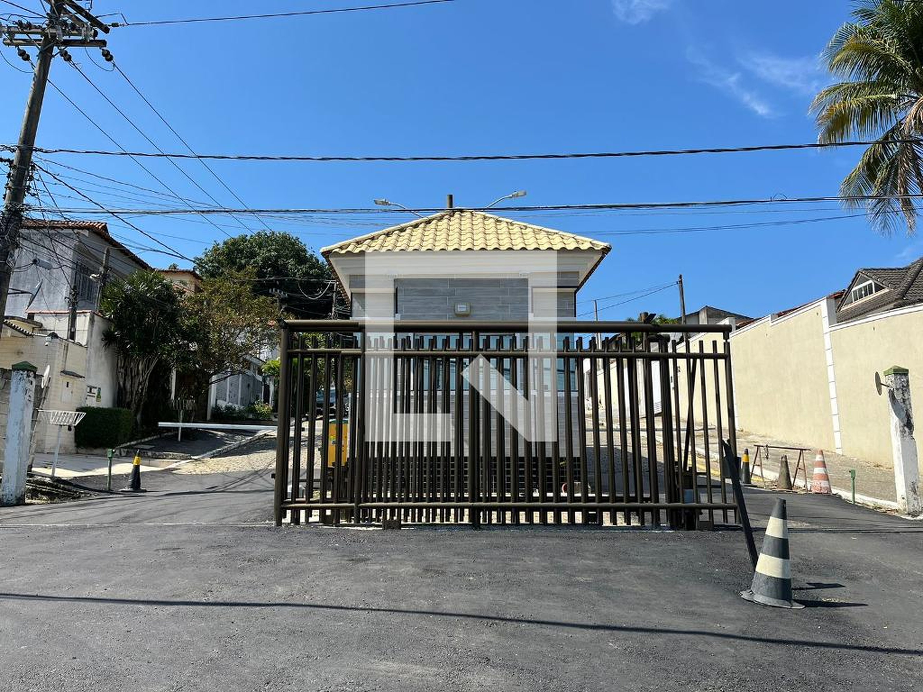 Fachada Condomínio em Rua Eliéser Gomes, 59