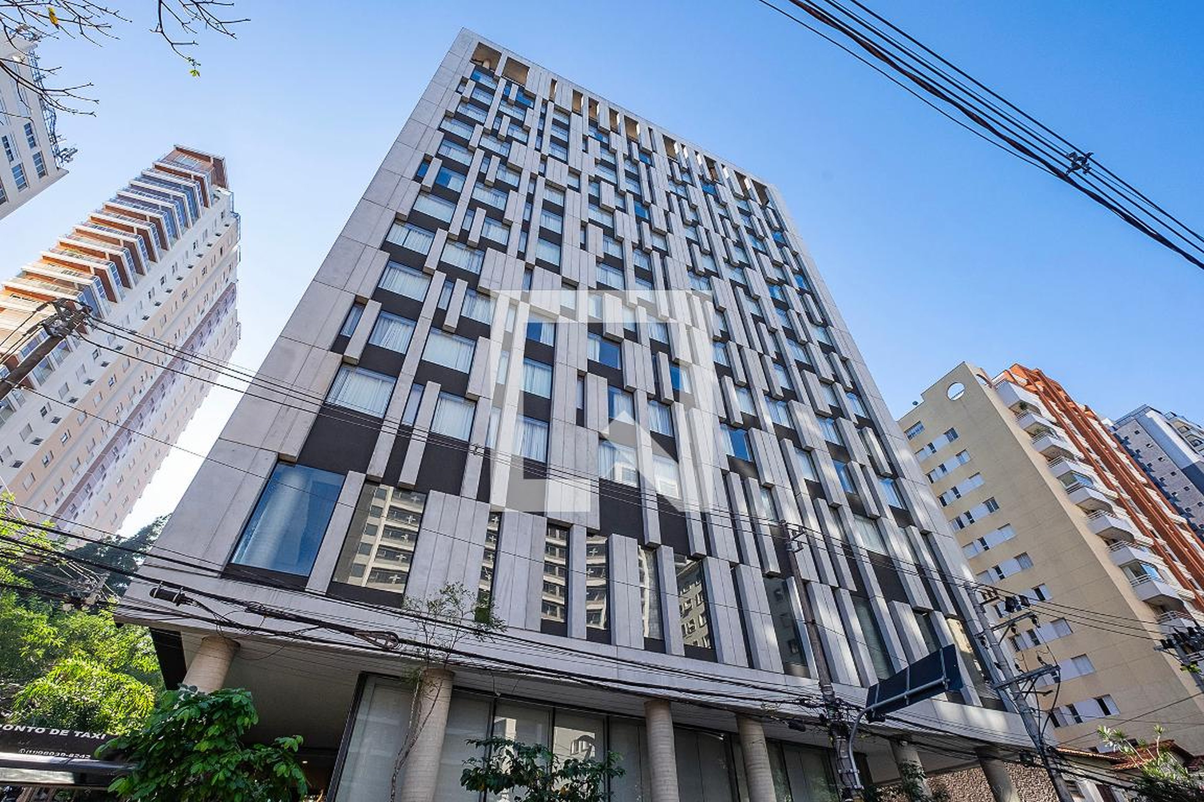 Fachada Condomínio em Rua Cristiano Viana, 318