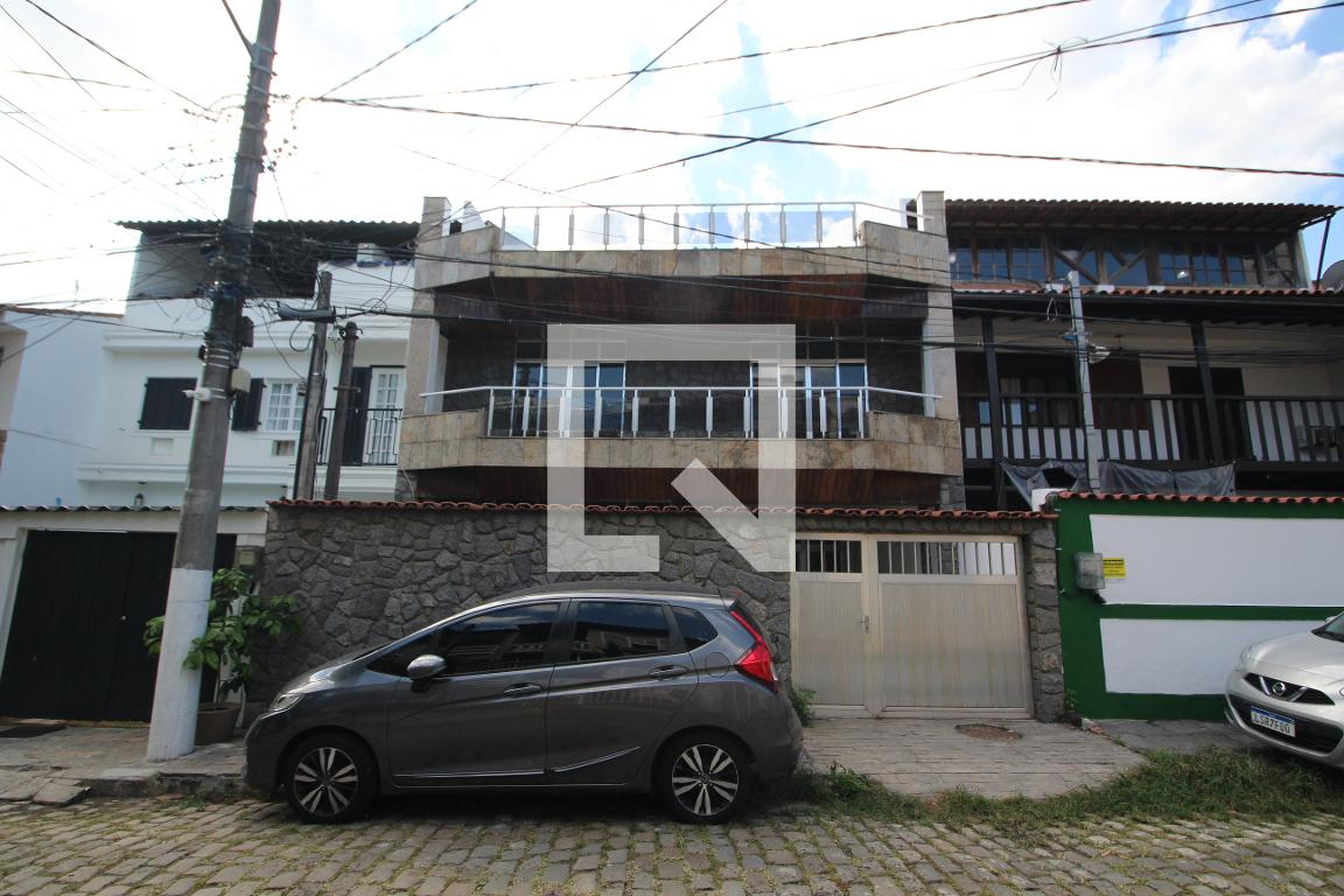 Fachada Condomínio em Rua Assis Moura, 38