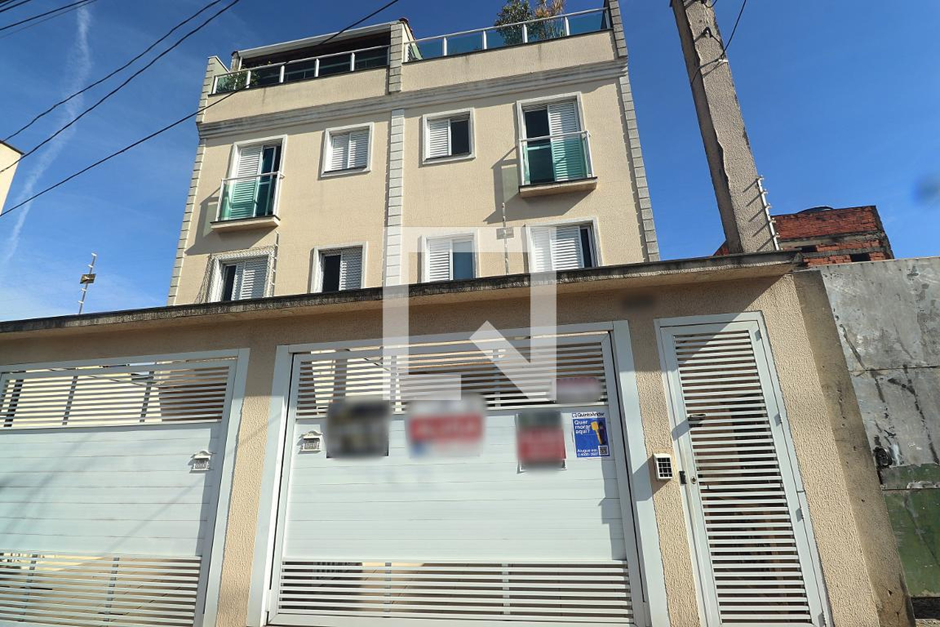 Fachada Condomínio em Rua Numidia, 539