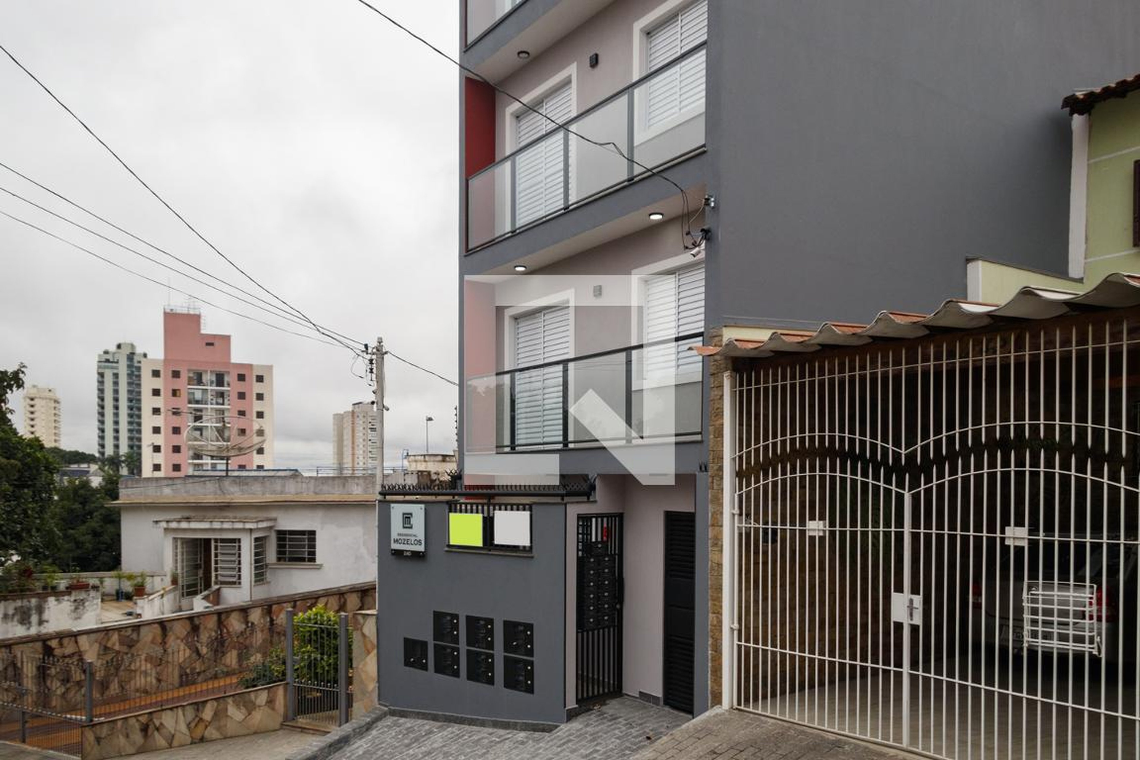 Fachada Condomínio em Rua Mozelos, 240