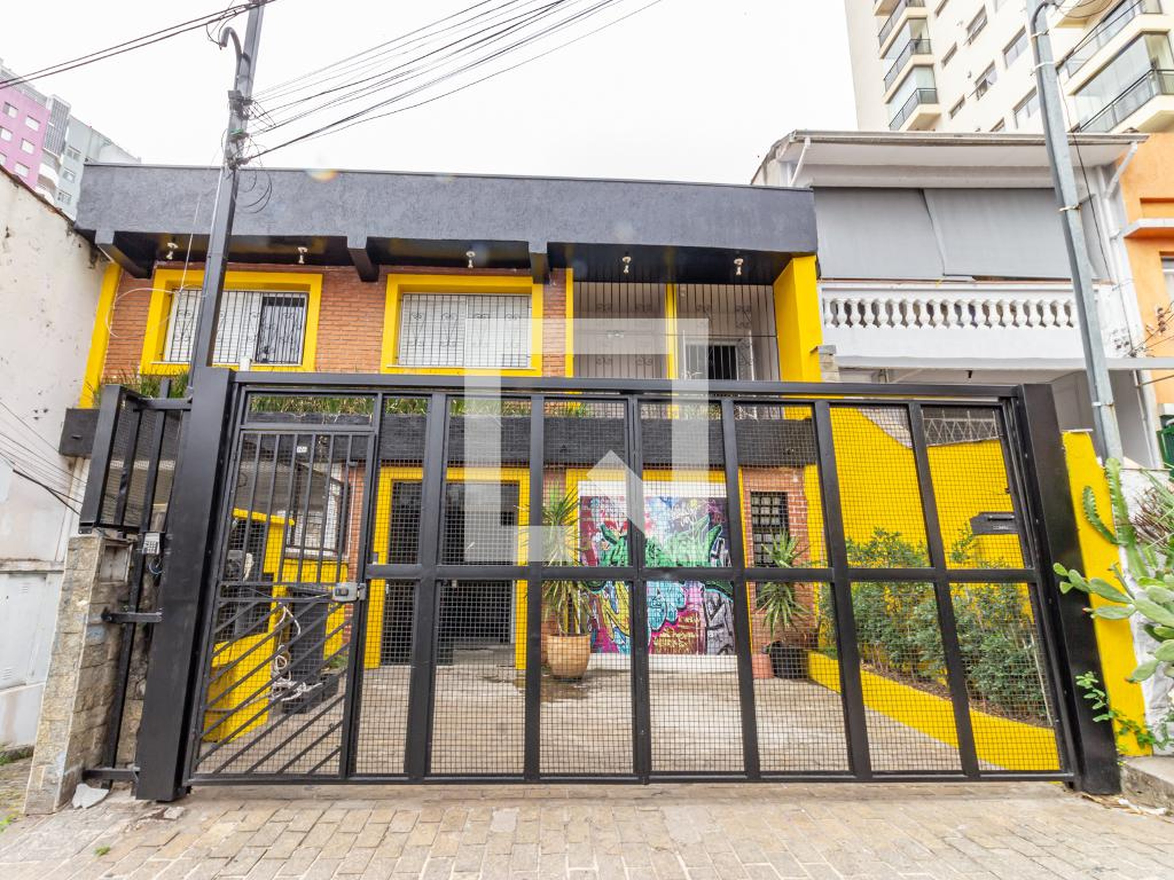 Fachada Condomínio Izy Loft  Moradias Práticas