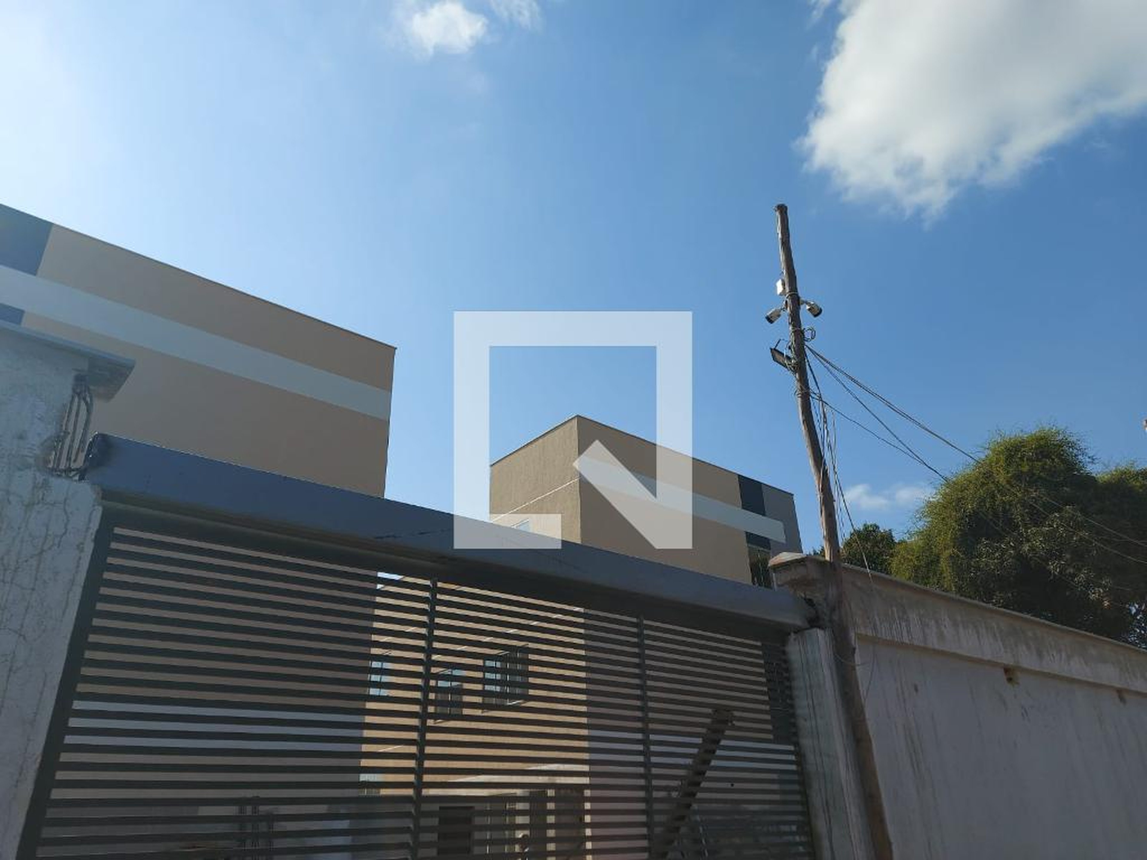 Fachada Condomínio em Rua Miquelina Dias Menezes, 556